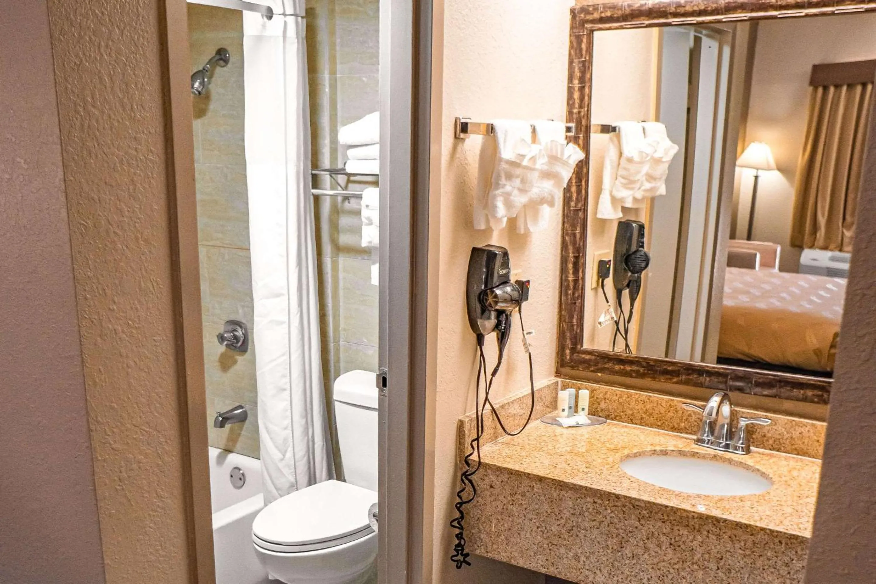 Bathroom, Bed in Quality Inn & Suites near Six Flags - Austell