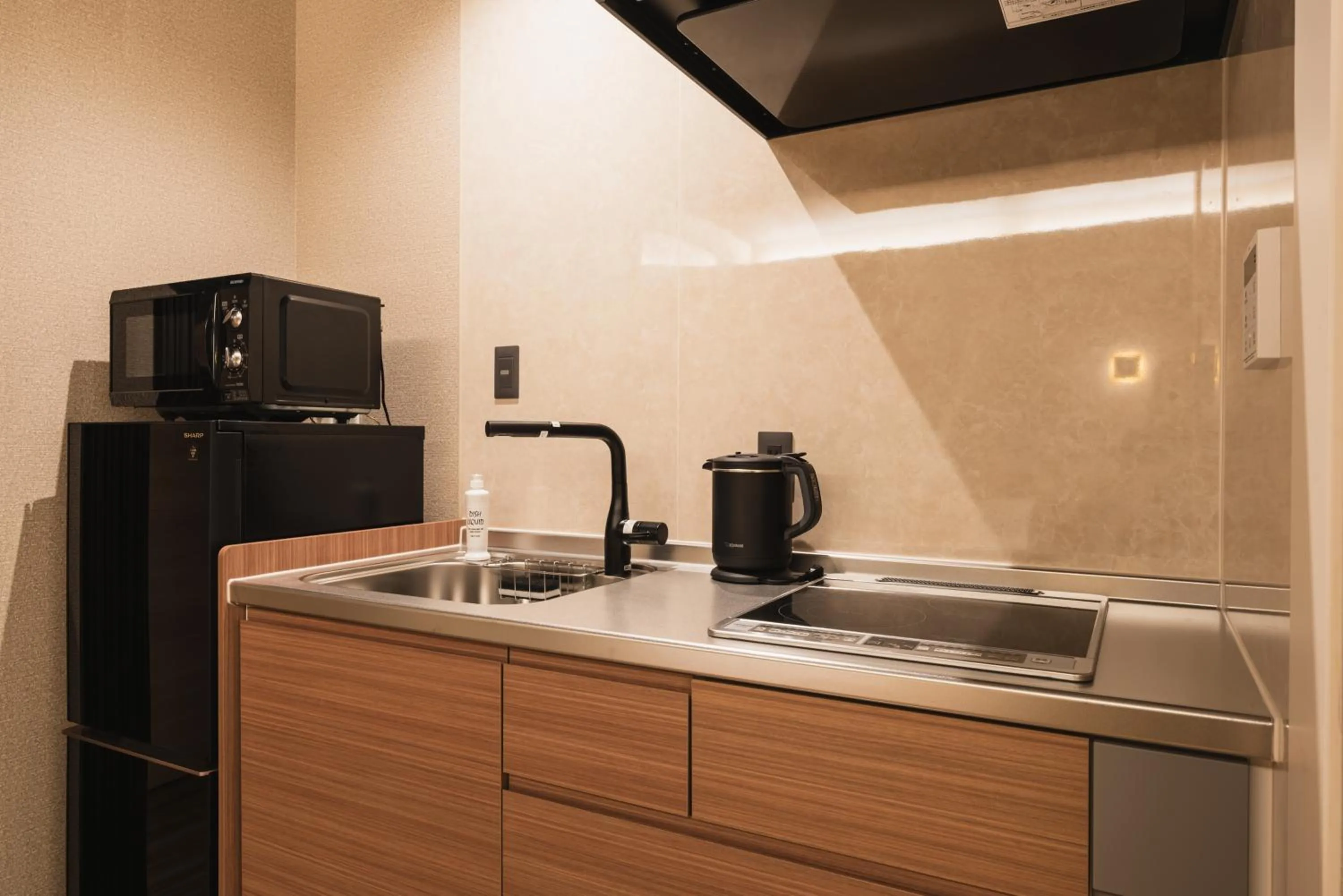 Kitchen or kitchenette in GRAND BASE Beppu Ekihigashi