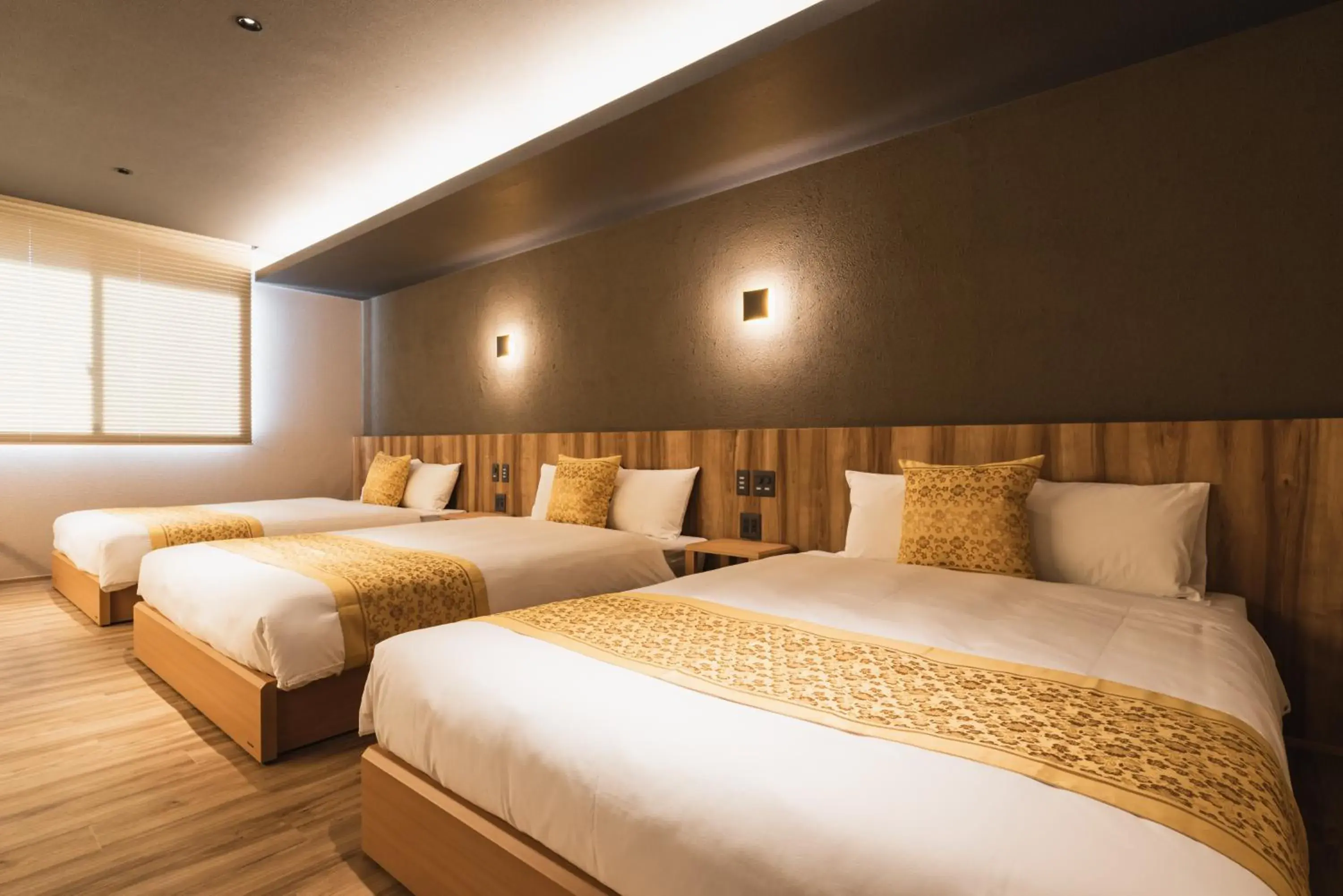 Bed in GRAND BASE Beppu Ekihigashi Bed in GRAND BASE Beppu Ekihigashi