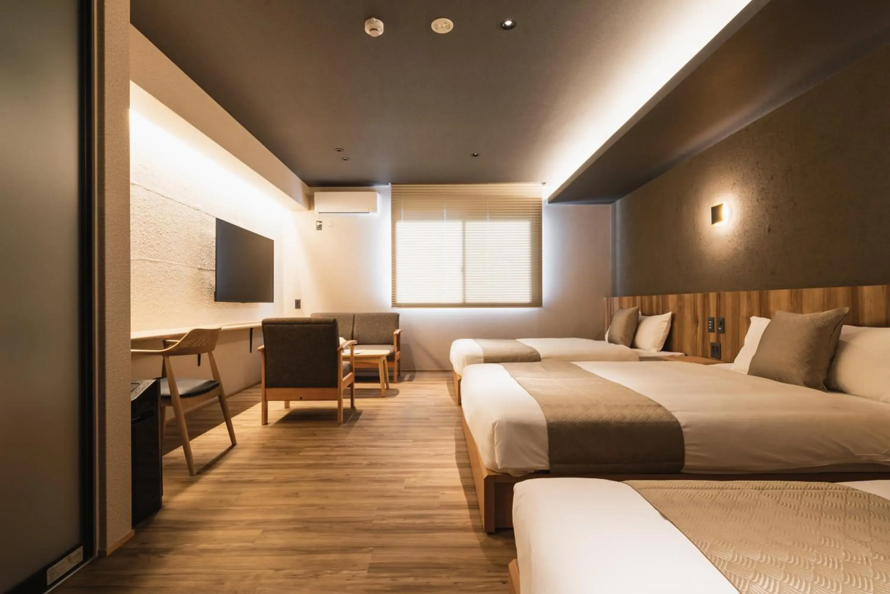 Photo of the whole room, Bed in GRAND BASE Beppu Ekihigashi Photo of the whole room, Bed in GRAND BASE Beppu Ekihigashi