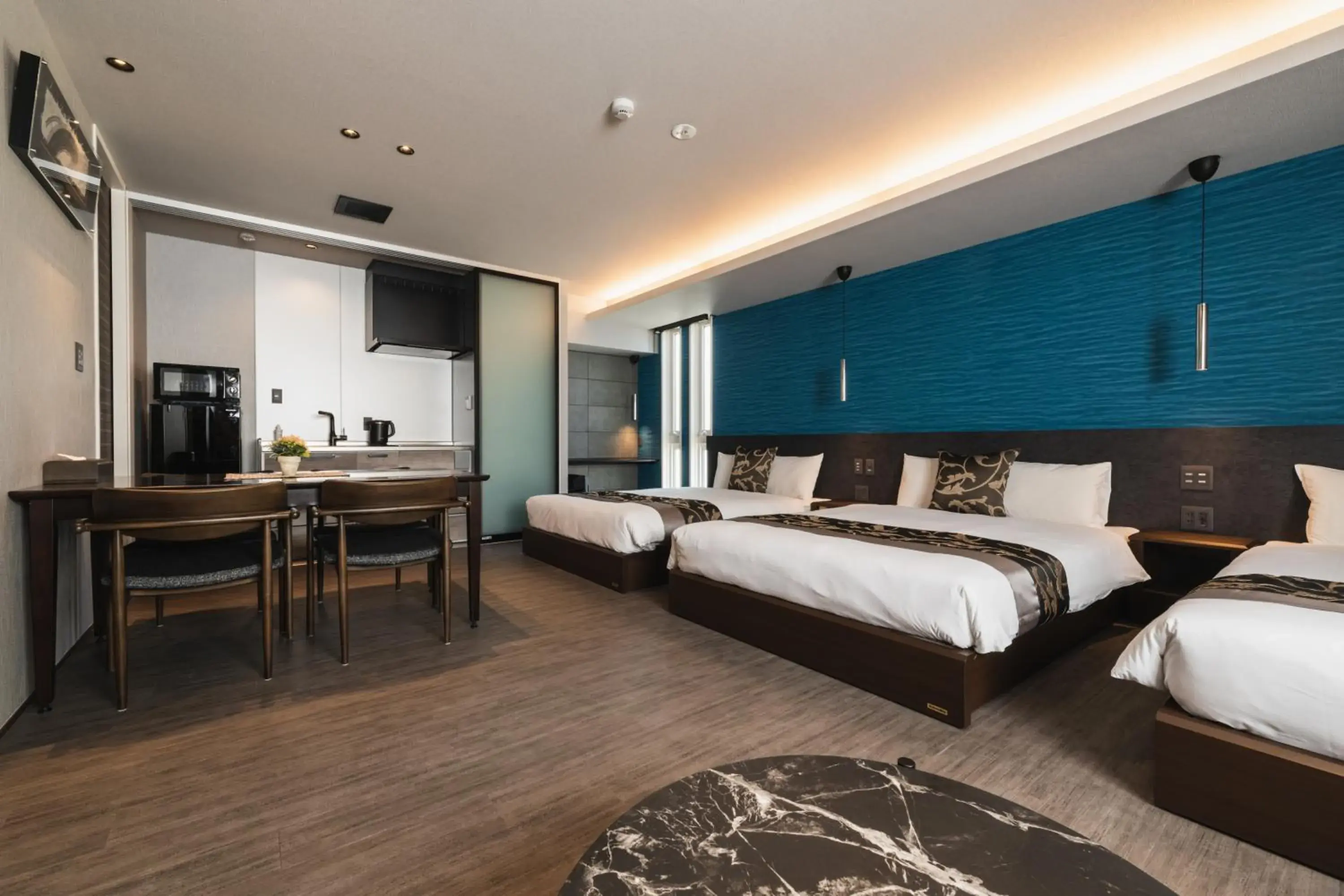 Photo of the whole room, Bed in GRAND BASE Beppu Ekihigashi Photo of the whole room, Bed in GRAND BASE Beppu Ekihigashi