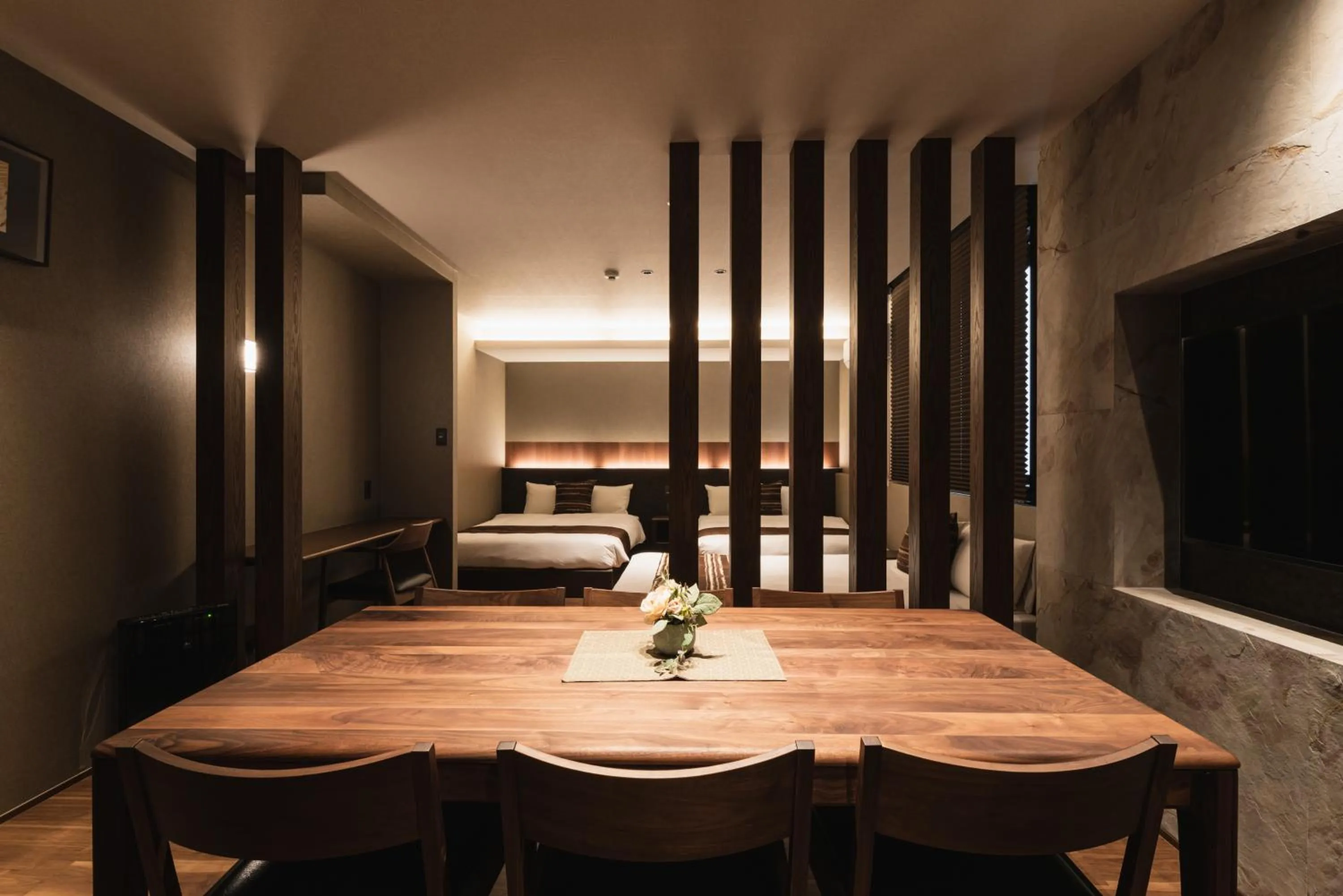 Photo of the whole room, Bed in GRAND BASE Beppu Ekihigashi