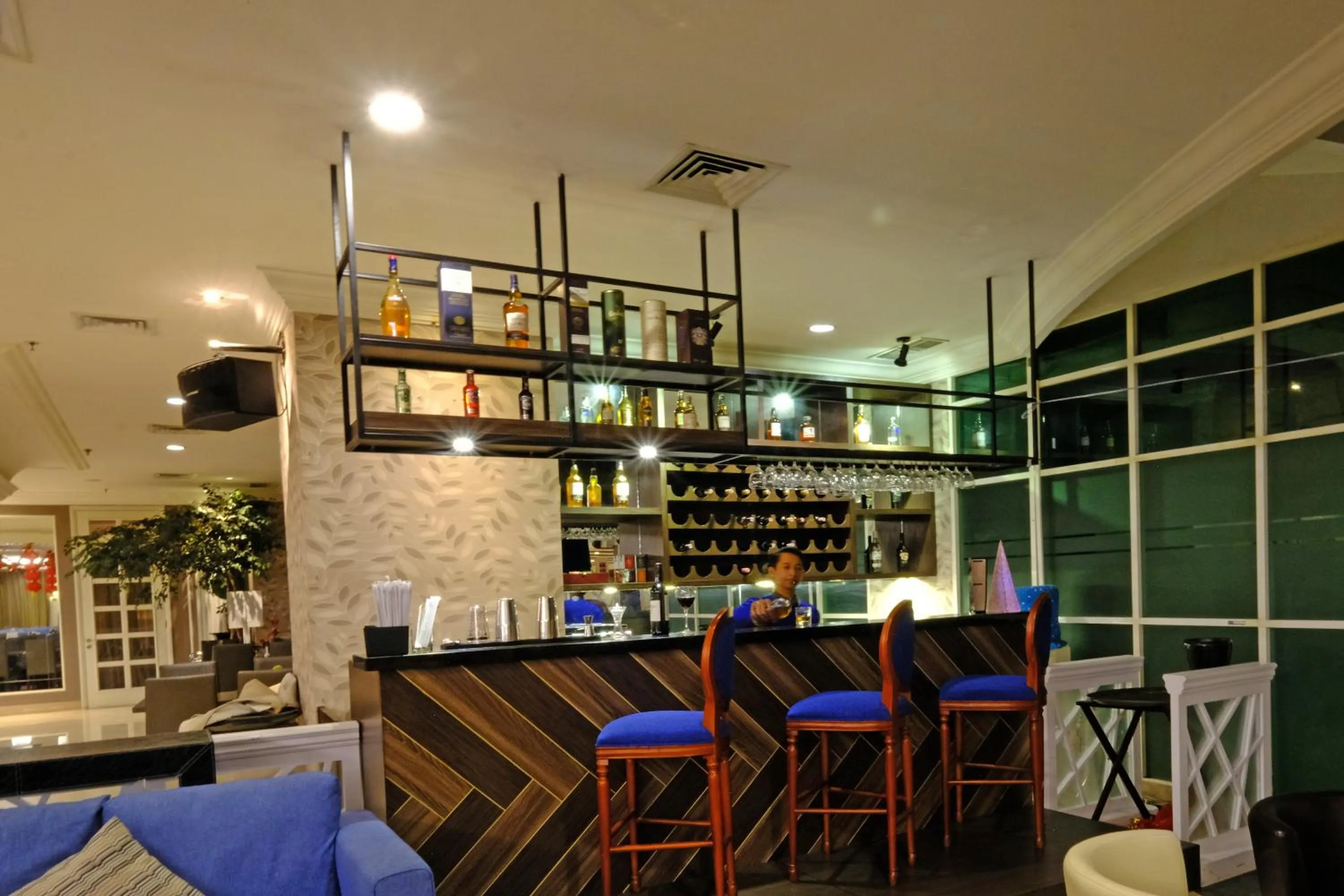 Lounge or bar in The Bellezza Suites by Nemuru