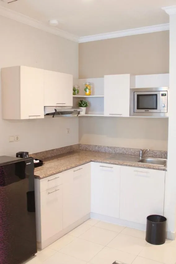 Kitchen or kitchenette in The Bellezza Suites by Nemuru