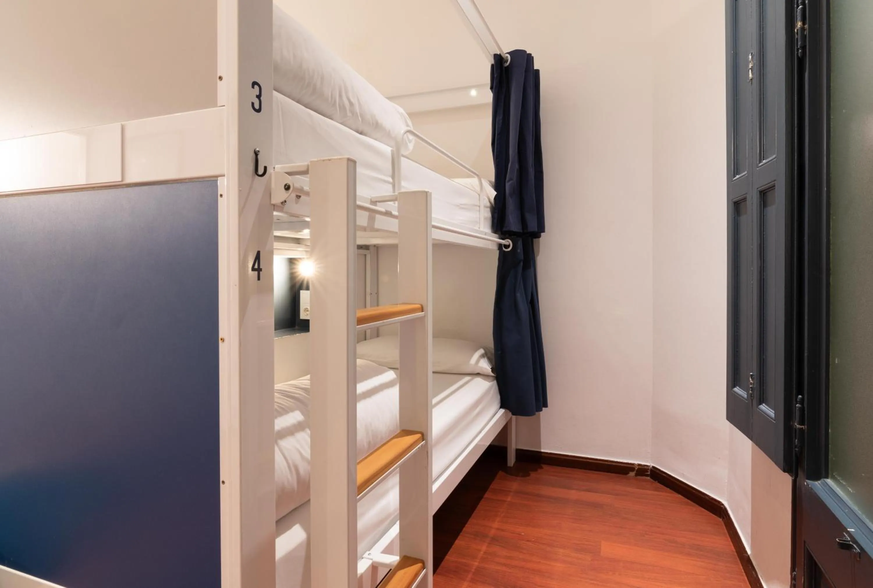 Bed in The Central House Barcelona Gracia