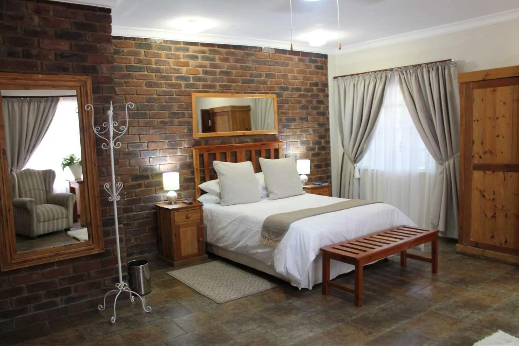 Bed in Ngwenya Boutique Hotel