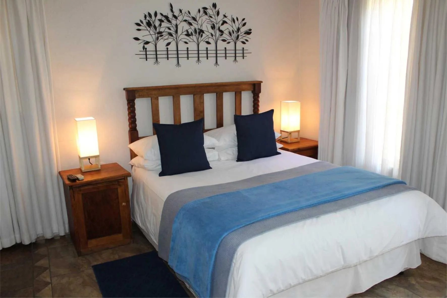 Bed in Ngwenya Boutique Hotel