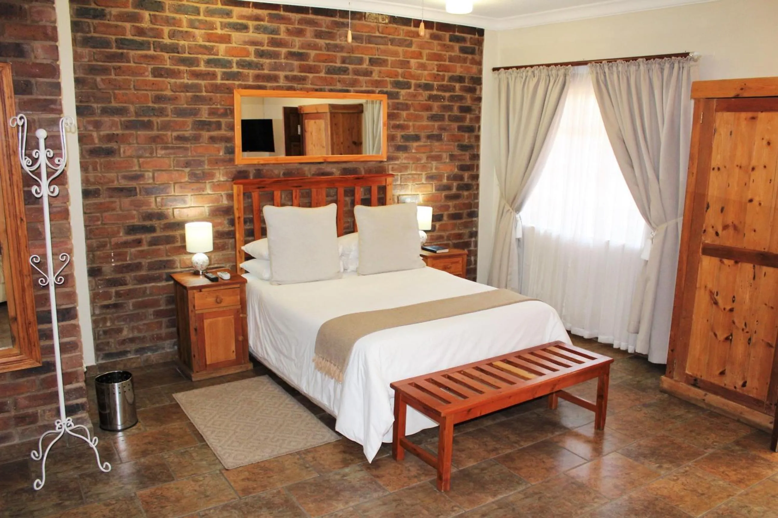 Bed in Ngwenya Boutique Hotel