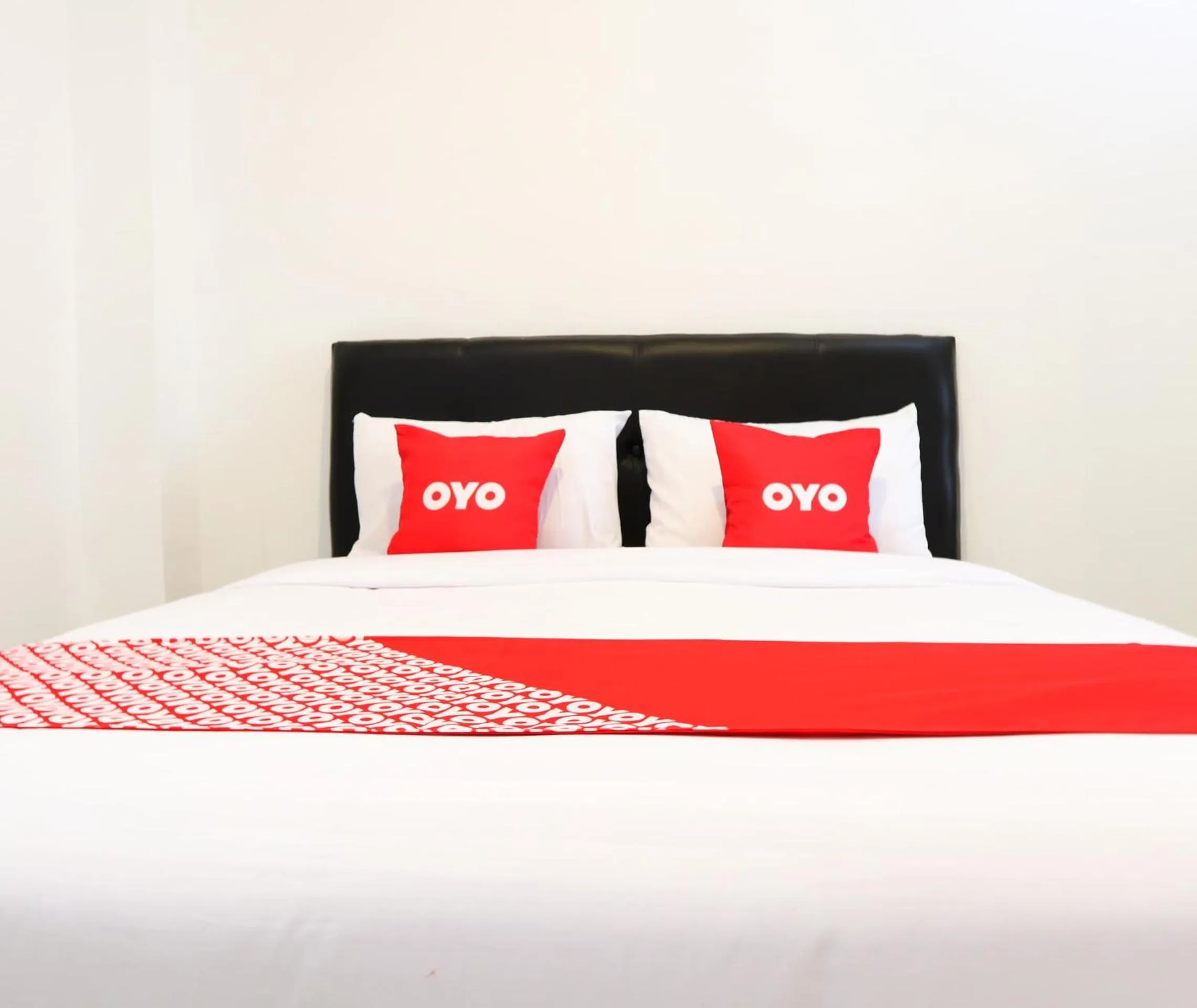 Bedroom in Hotel O Monalisa Residence And Cafe