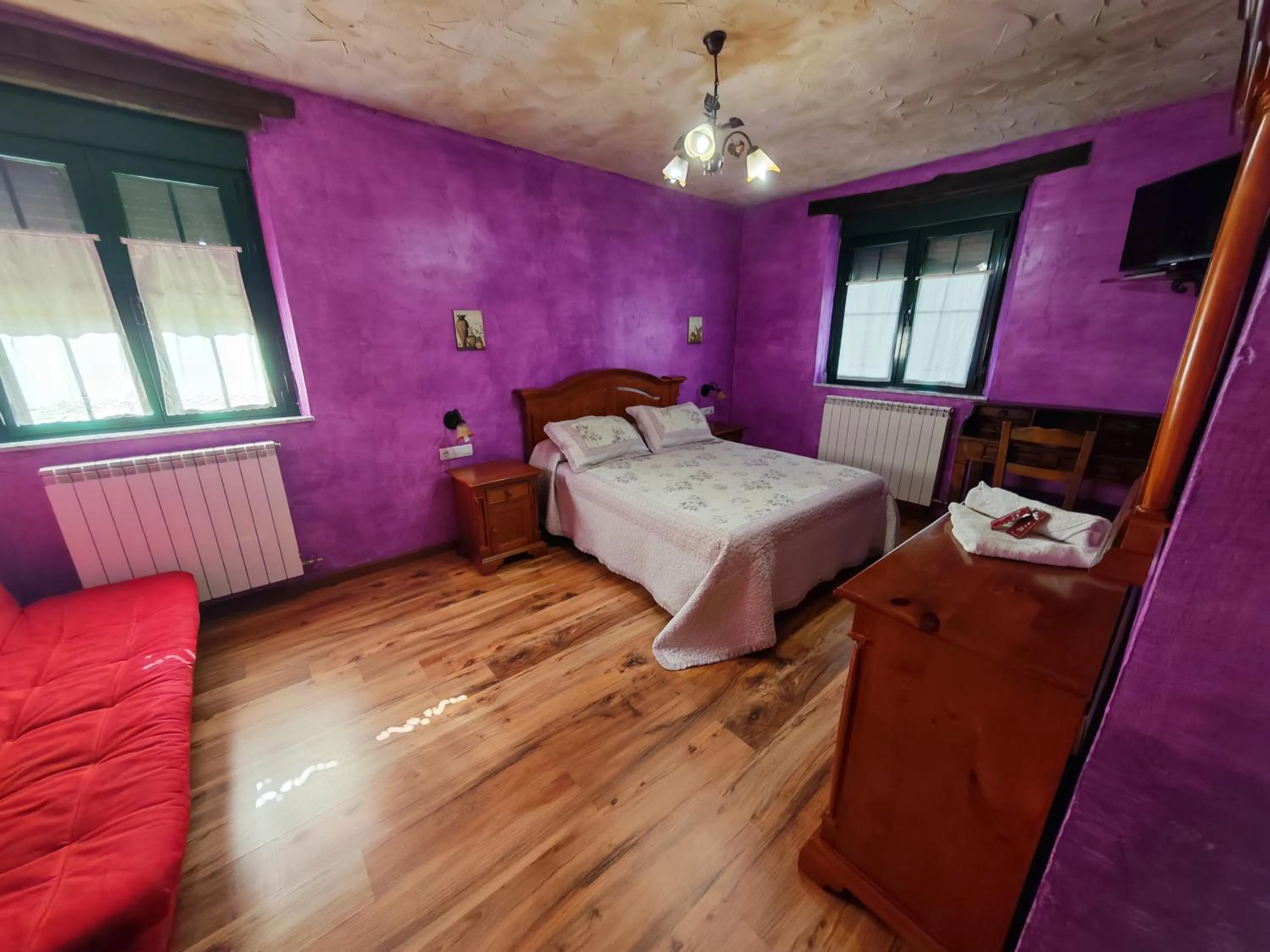 Bed in Hostería Casa Flor