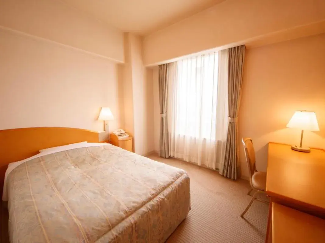 Bed in Plaza Inn Mizusawa Bed in Plaza Inn Mizusawa