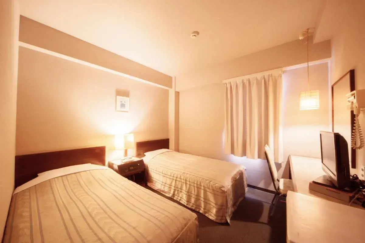 Bed in Plaza Inn Mizusawa Bed in Plaza Inn Mizusawa