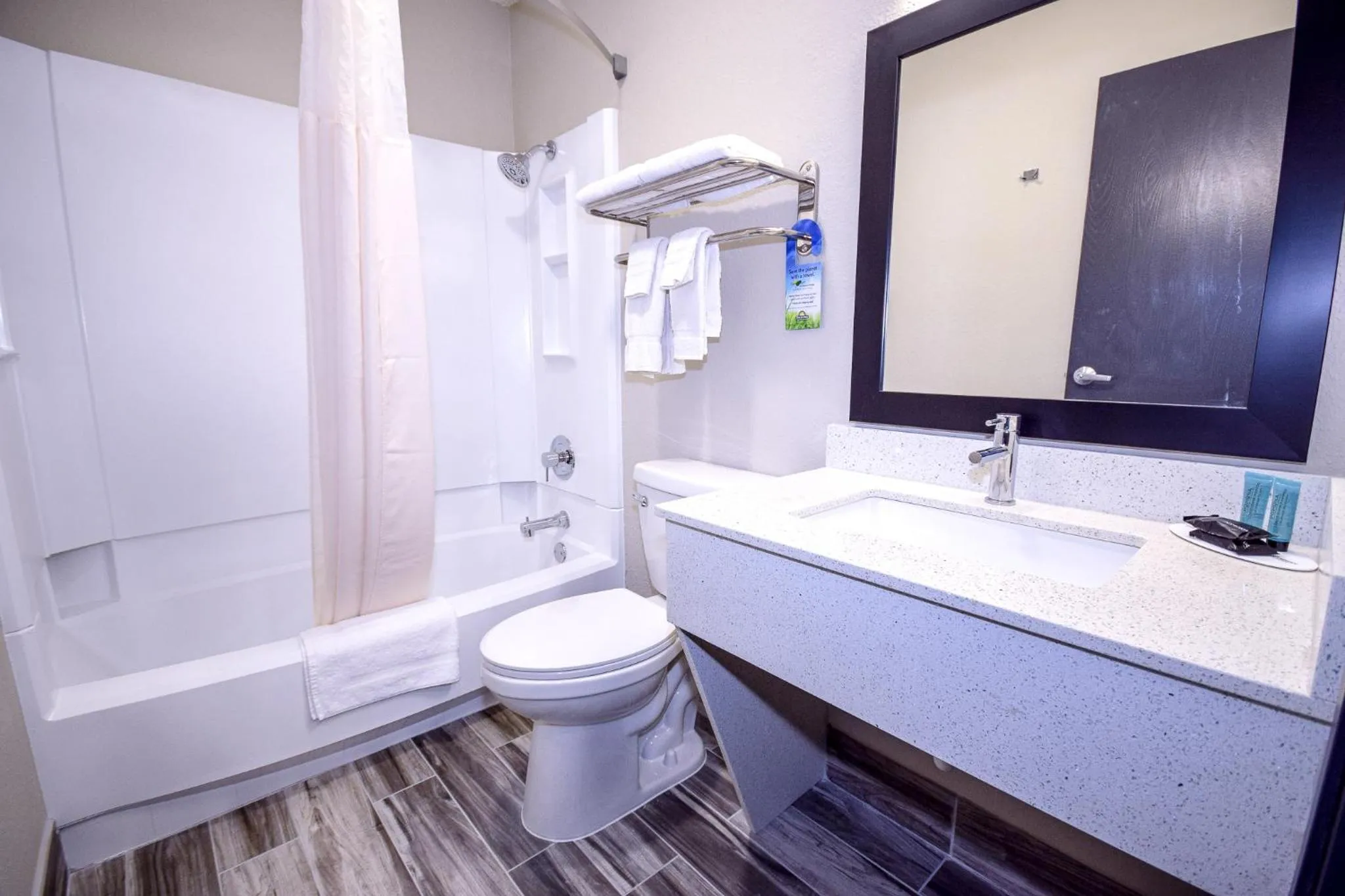 Bathroom in Days Inn & Suites by Wyndham Wisconsin Dells