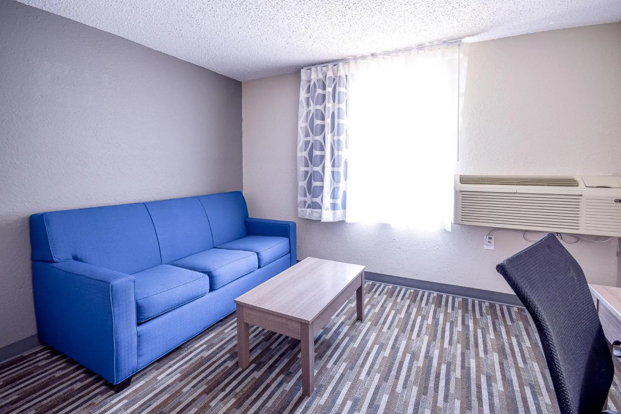 Seating area in Days Inn & Suites by Wyndham Wisconsin Dells