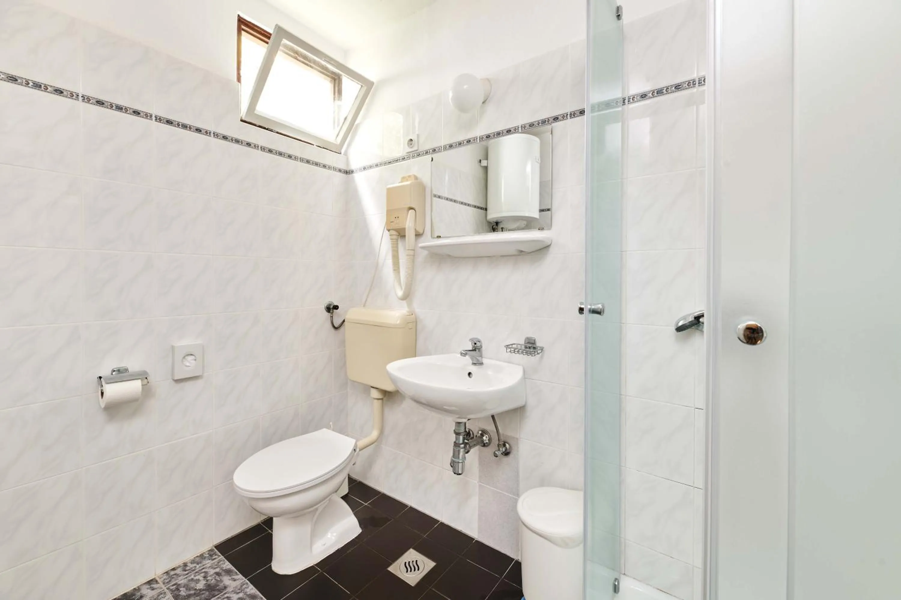 Bathroom in Apartments Astra