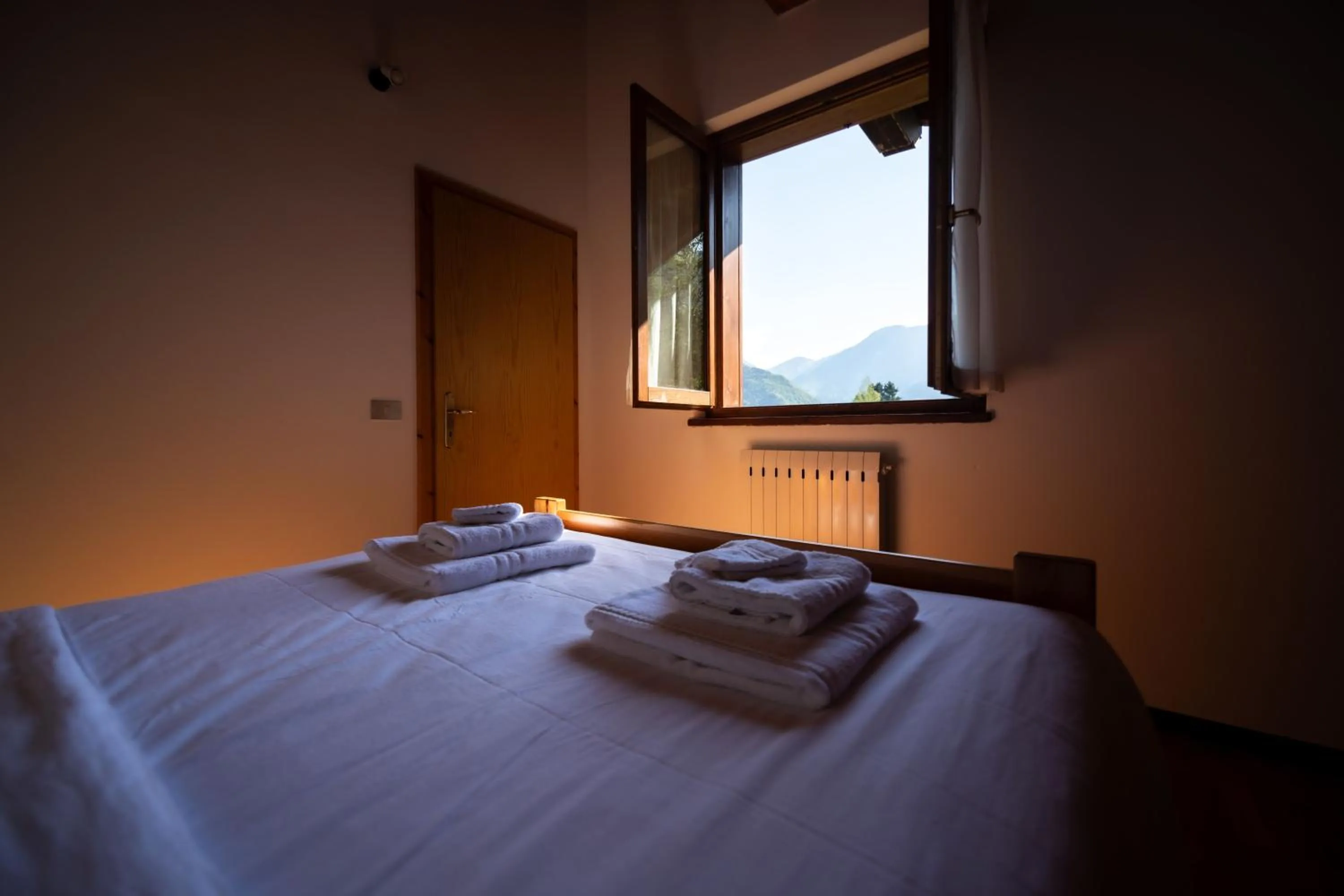 Bedroom, Bed in Appartamenti Lembondel - Ledro