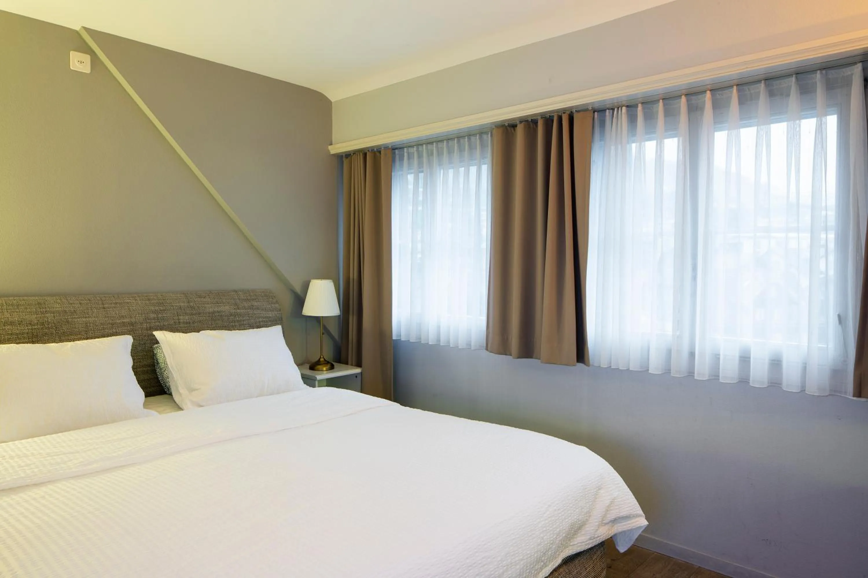 Photo of the whole room, Bed in Rigiblick am See