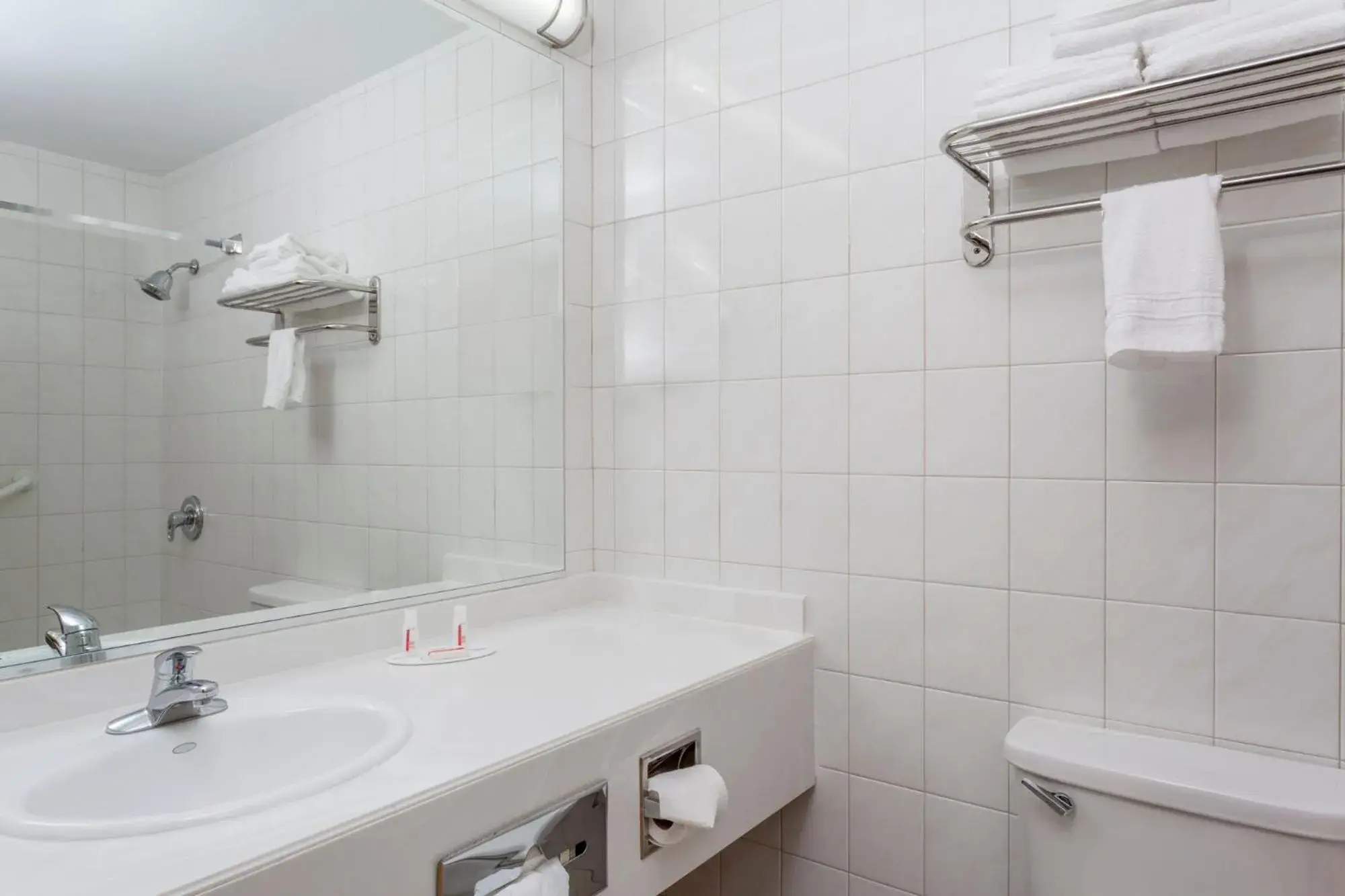 Bathroom in Days Inn by Wyndham Woodbury Long Island Bathroom in Days Inn by Wyndham Woodbury Long Island