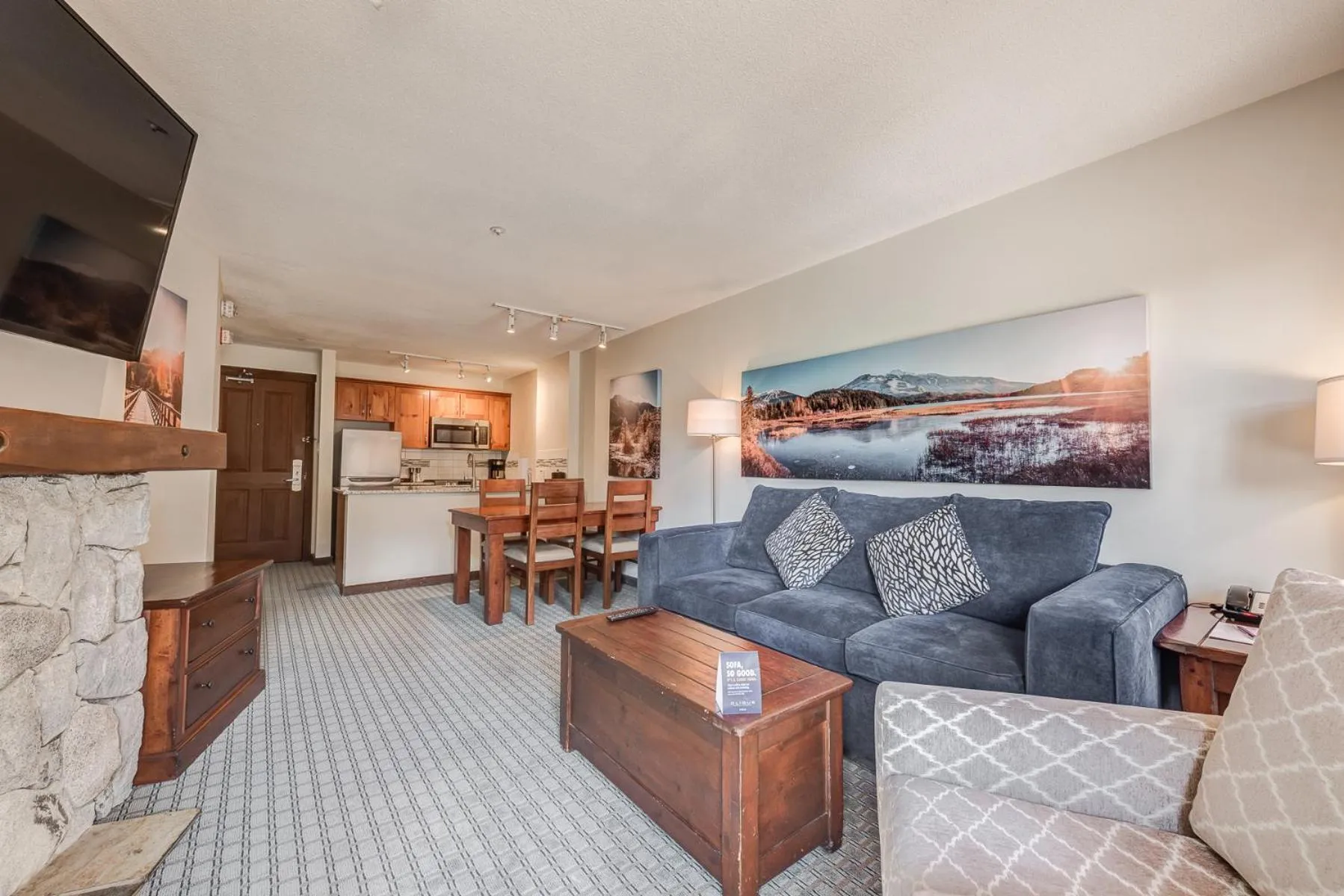 TV and multimedia in Blackcomb Springs Suites by CLIQUE