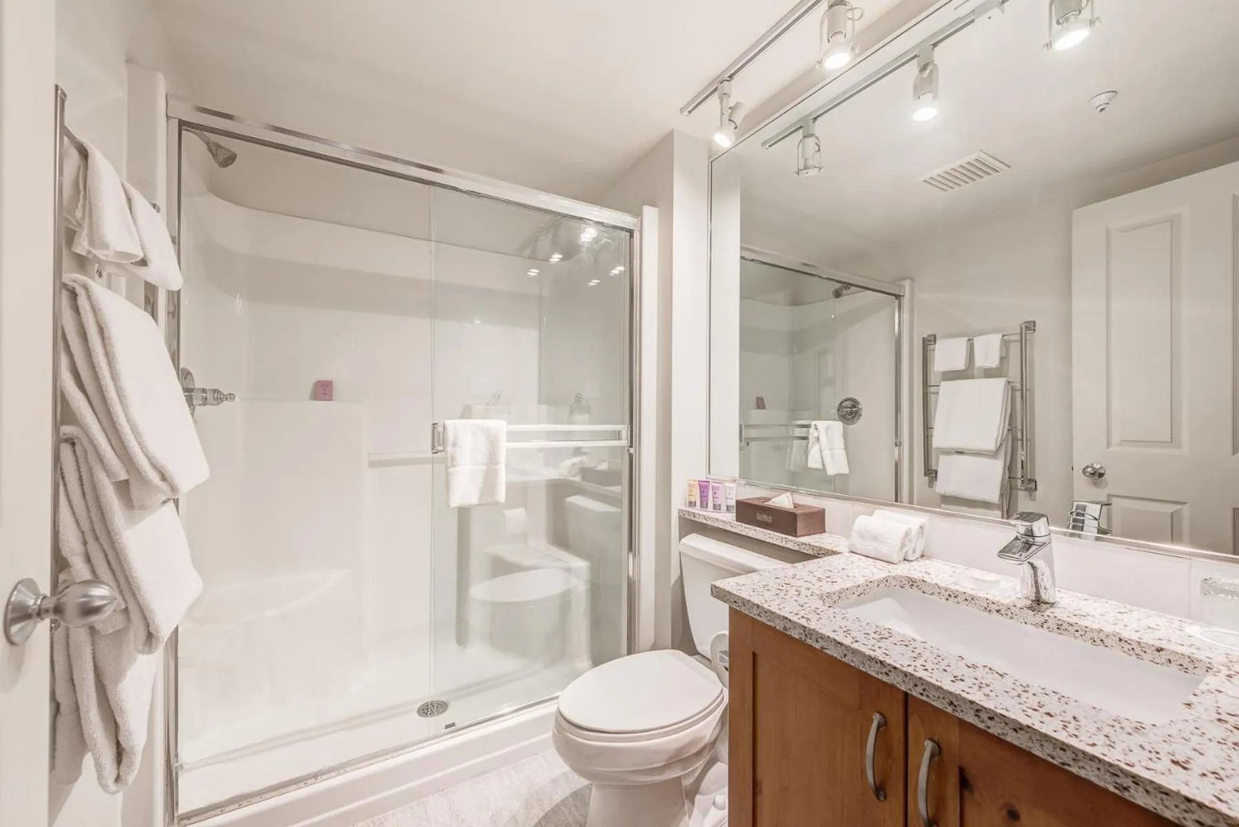 Shower in Blackcomb Springs Suites by CLIQUE