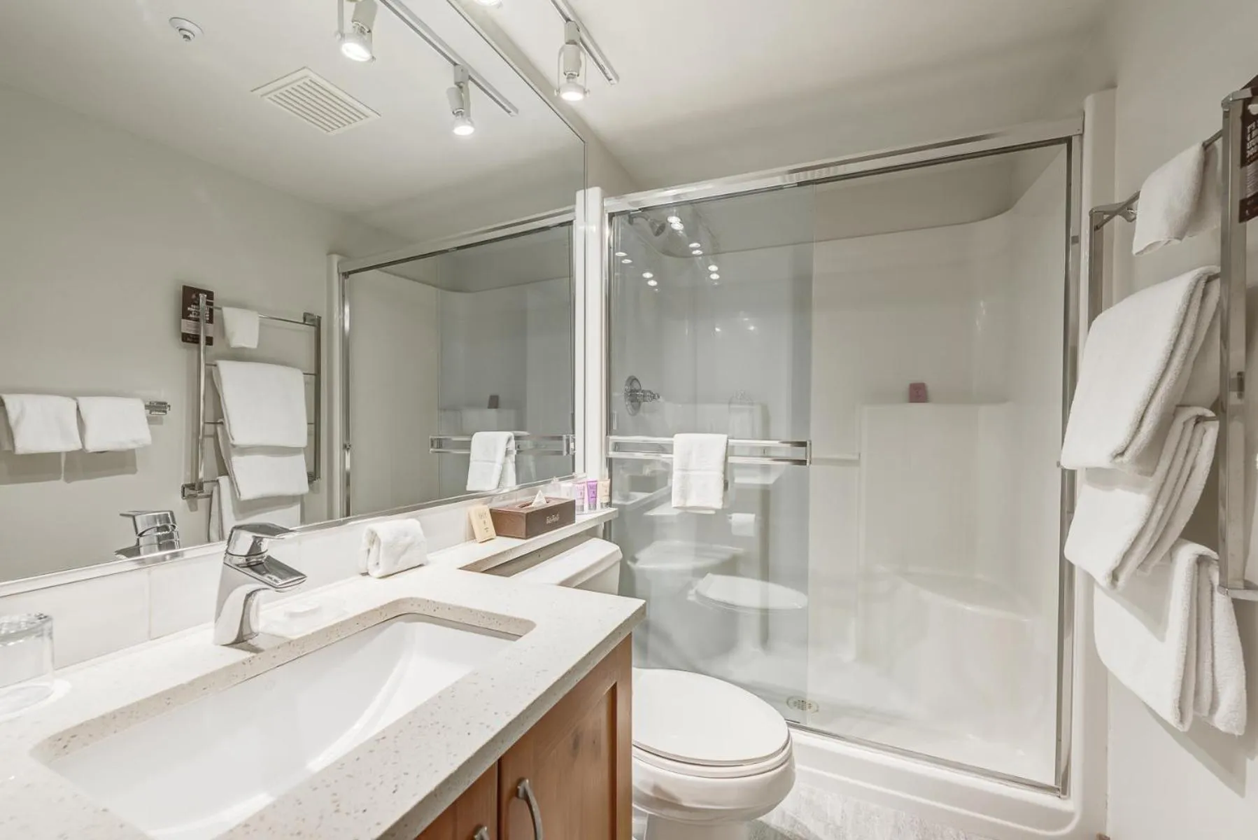 Shower in Blackcomb Springs Suites by CLIQUE