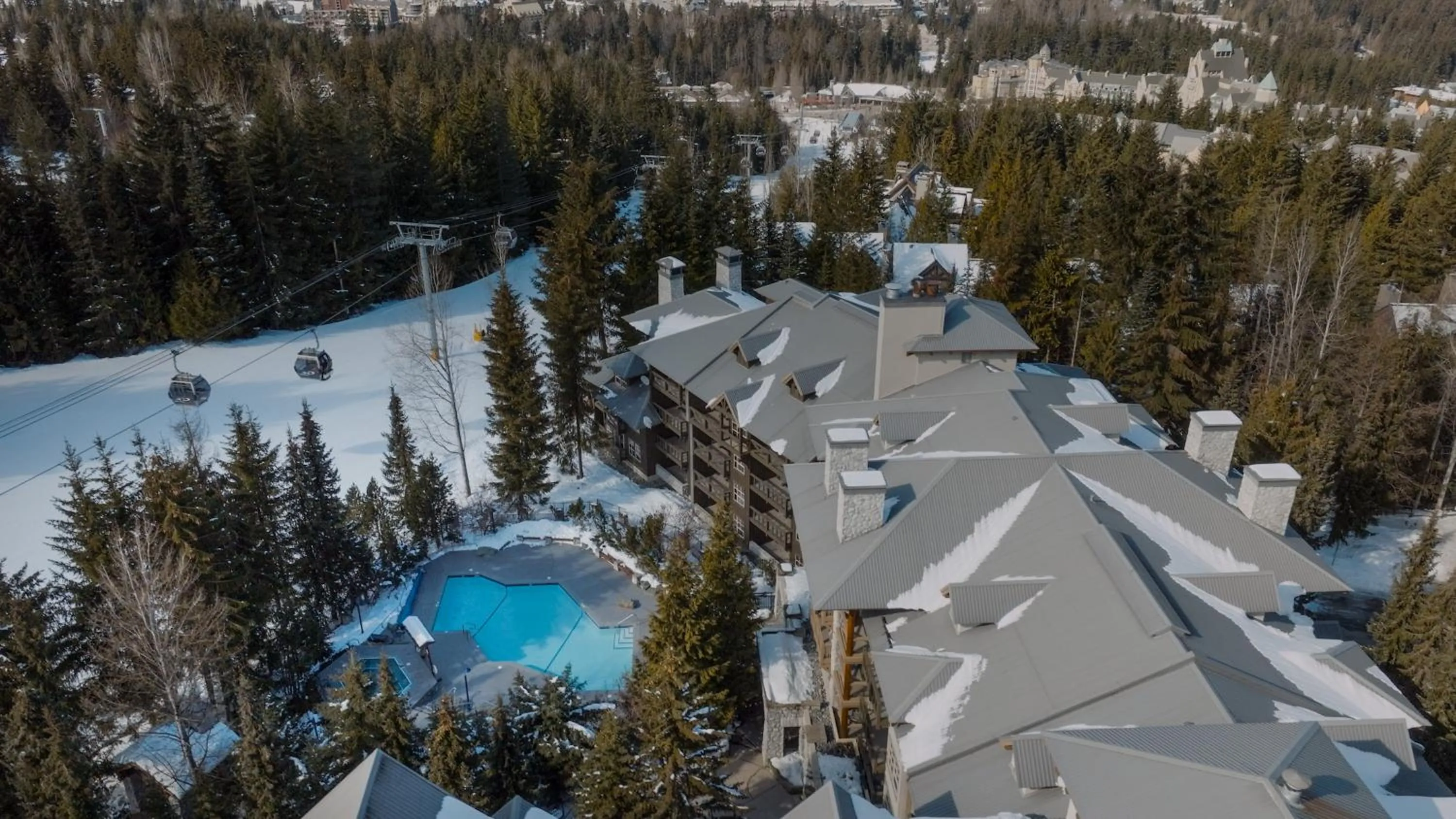 Property building in Blackcomb Springs Suites by CLIQUE