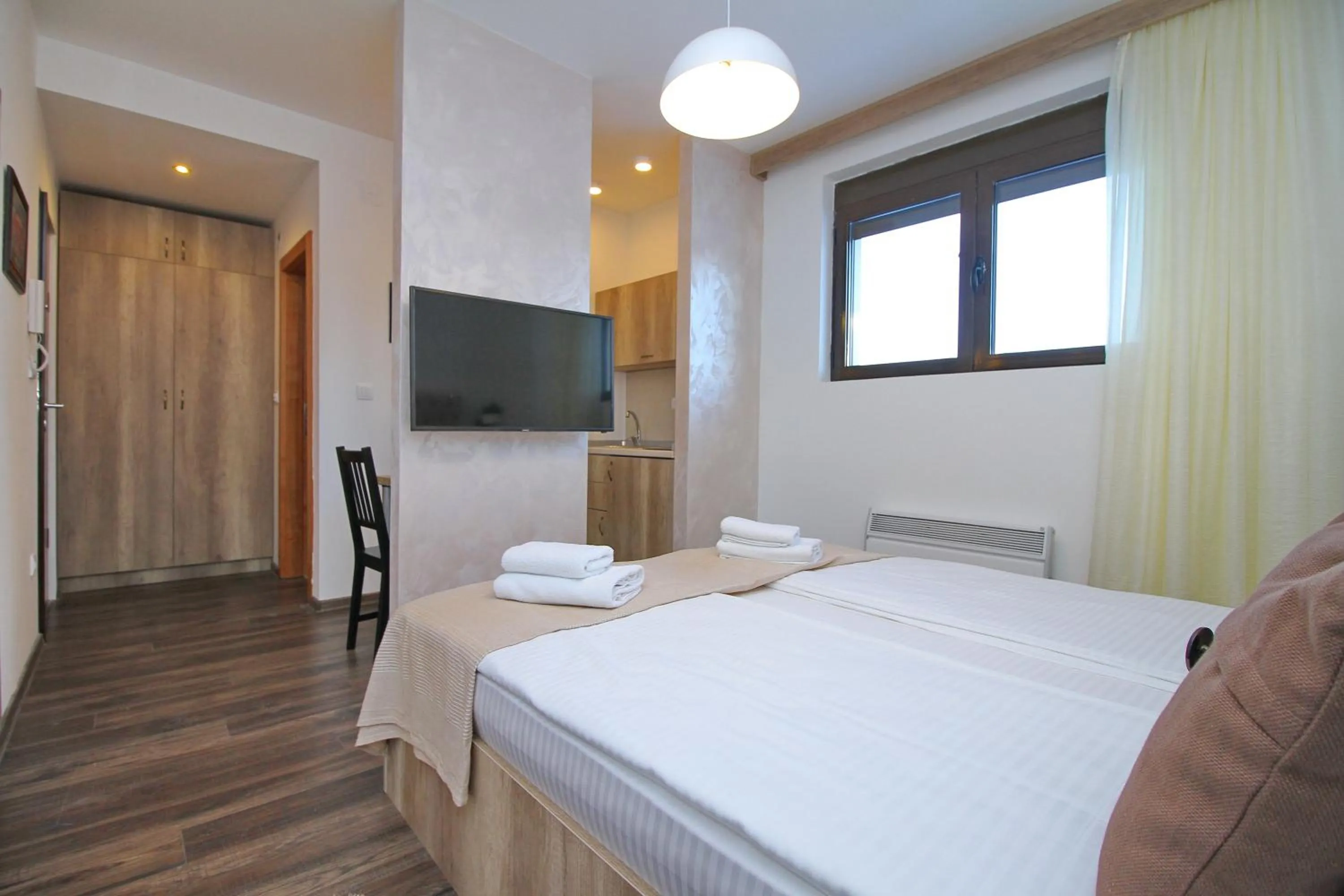 Photo of the whole room, Bed in All Seasons Residence