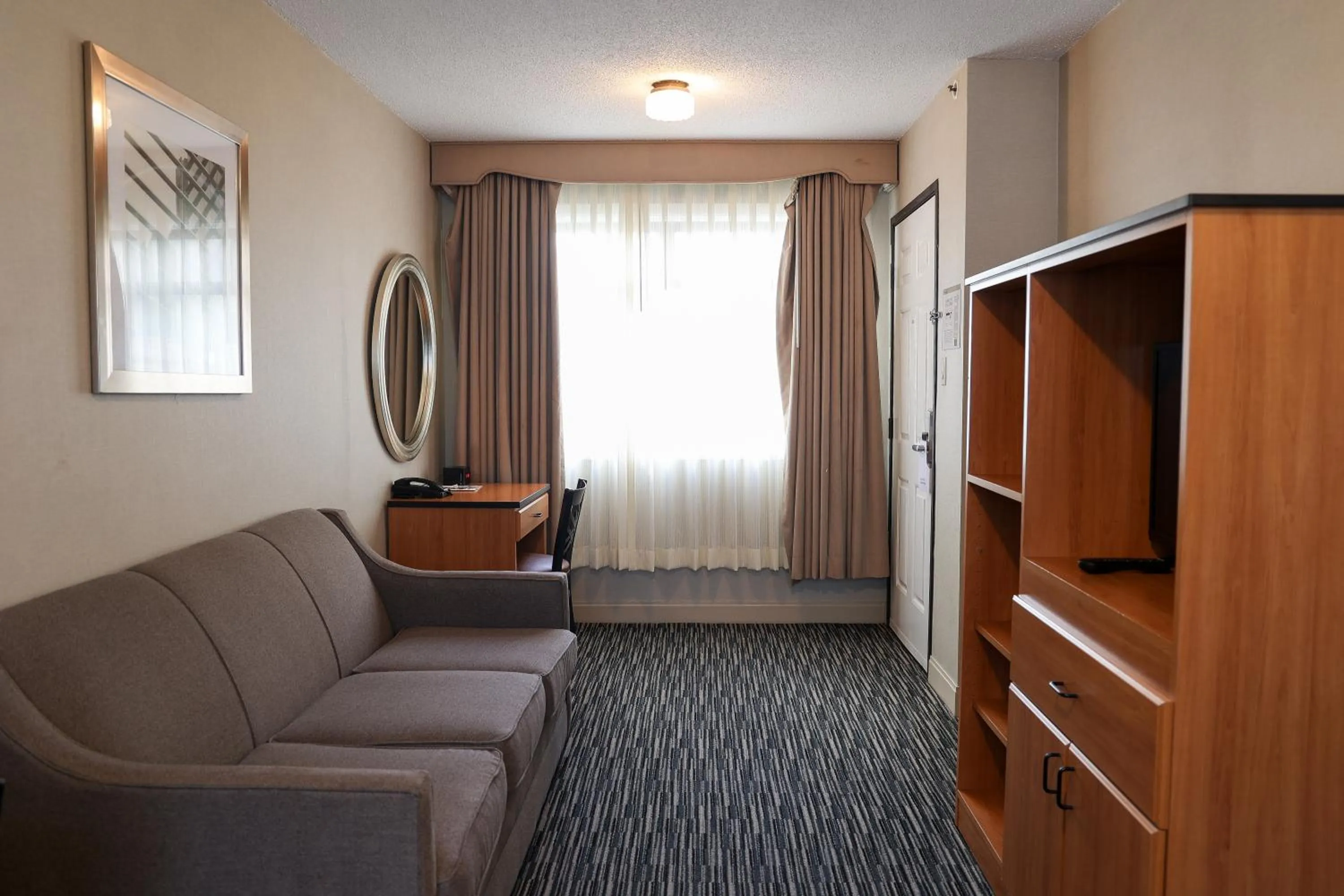 TV and multimedia in City Center Inn and Suites