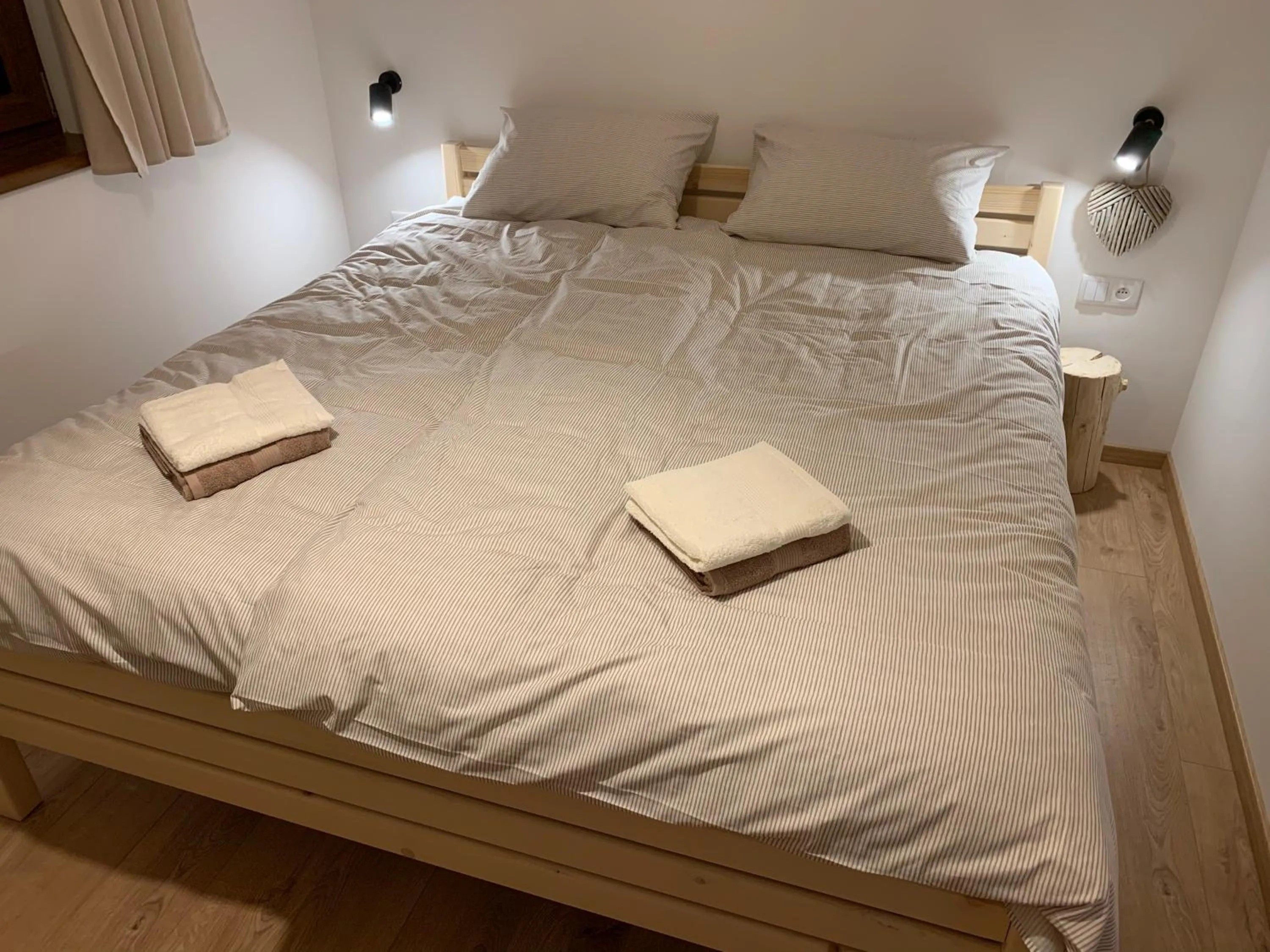 Bed in YASNA Apartments