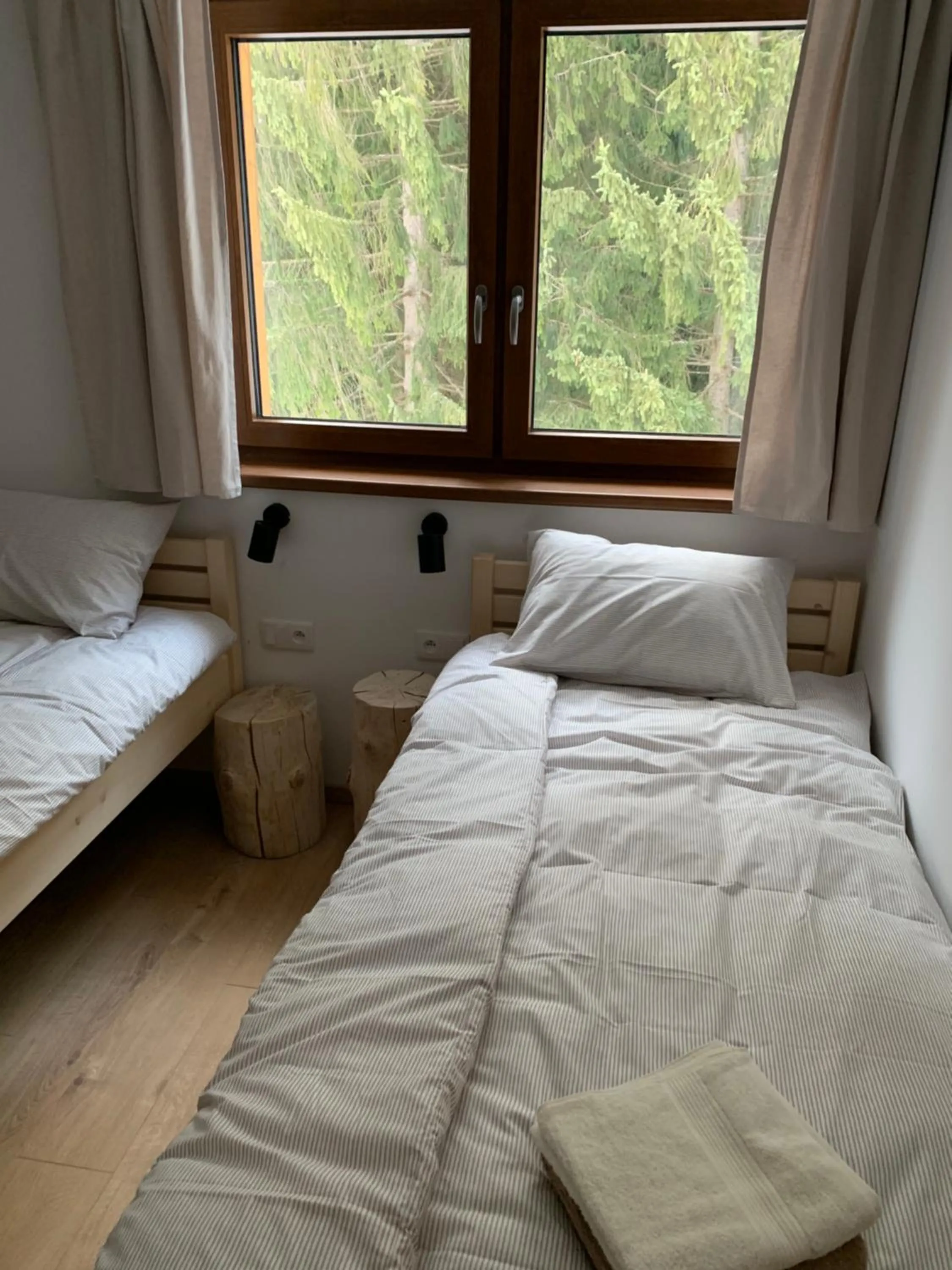 Bed in YASNA Apartments