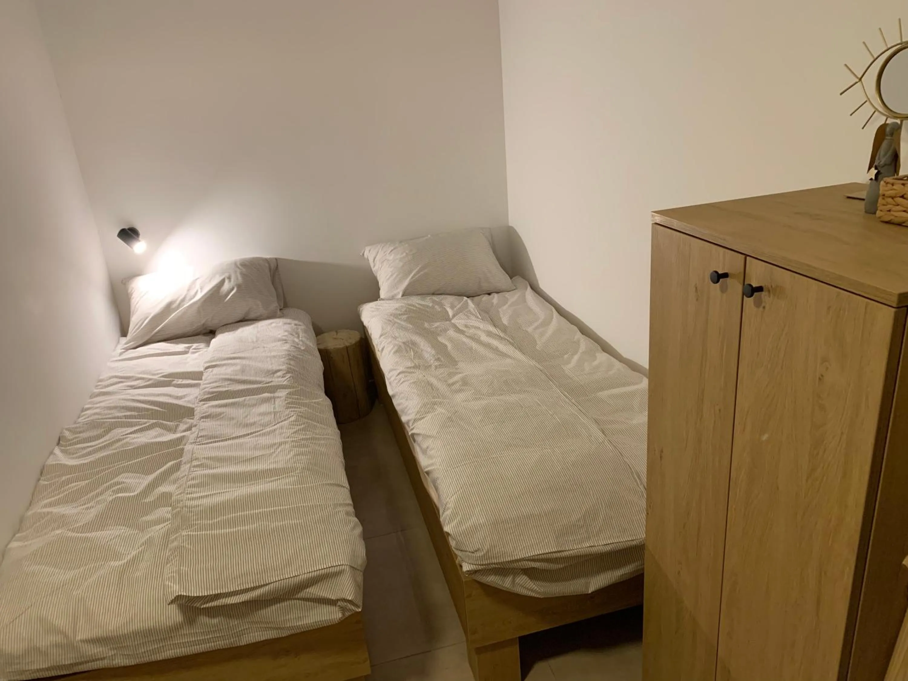 Bed in YASNA Apartments