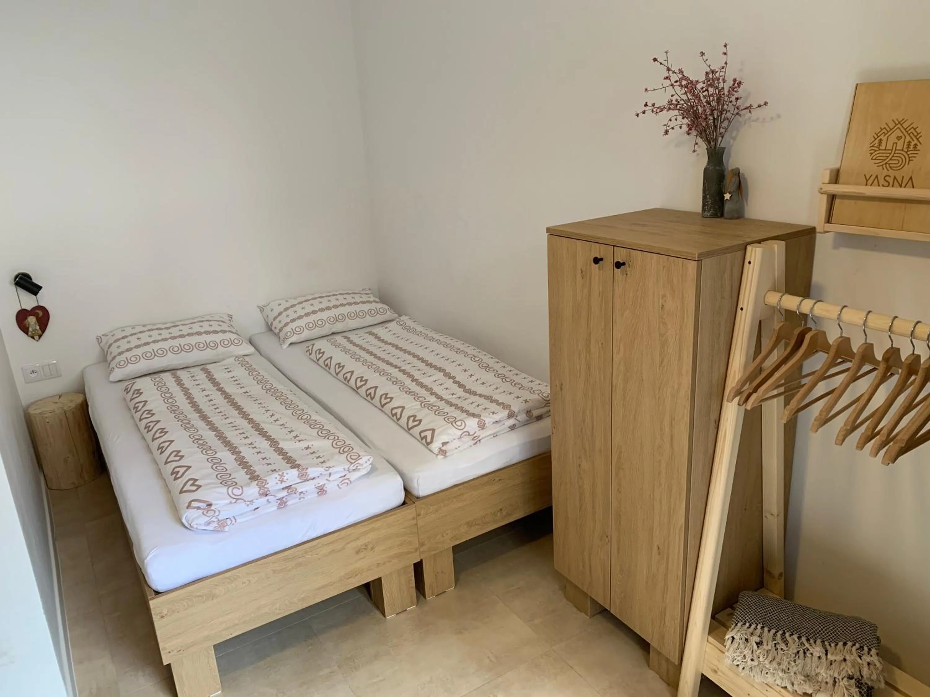 Bed in YASNA Apartments