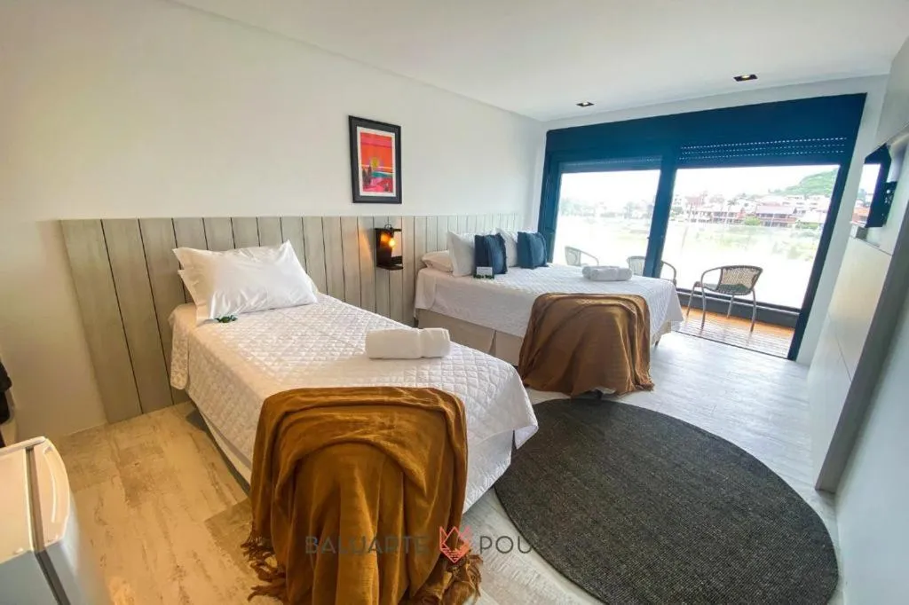 Bed in BALUARTE POUSADA