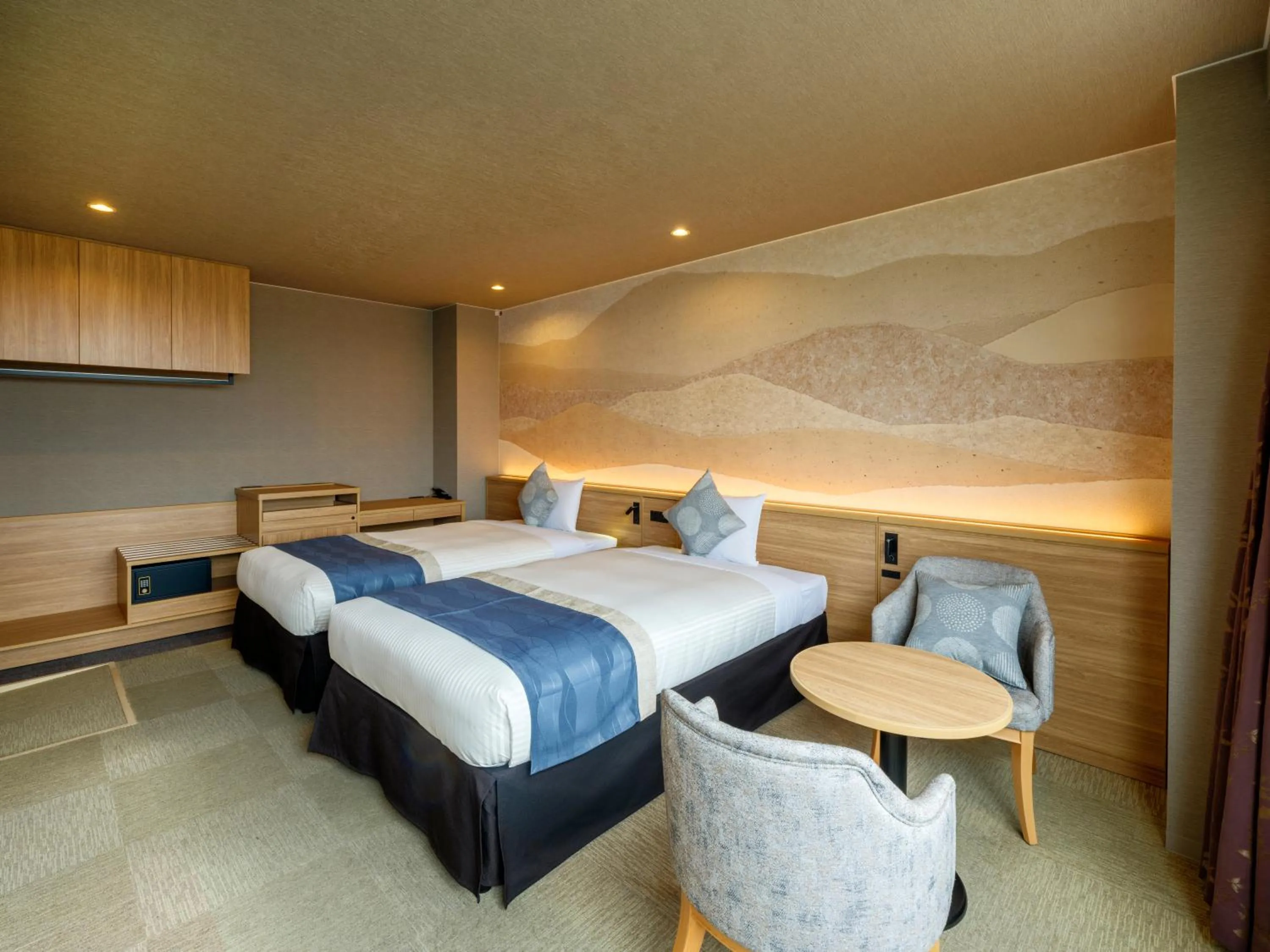 Bed in KAMENOI HOTEL Oarai