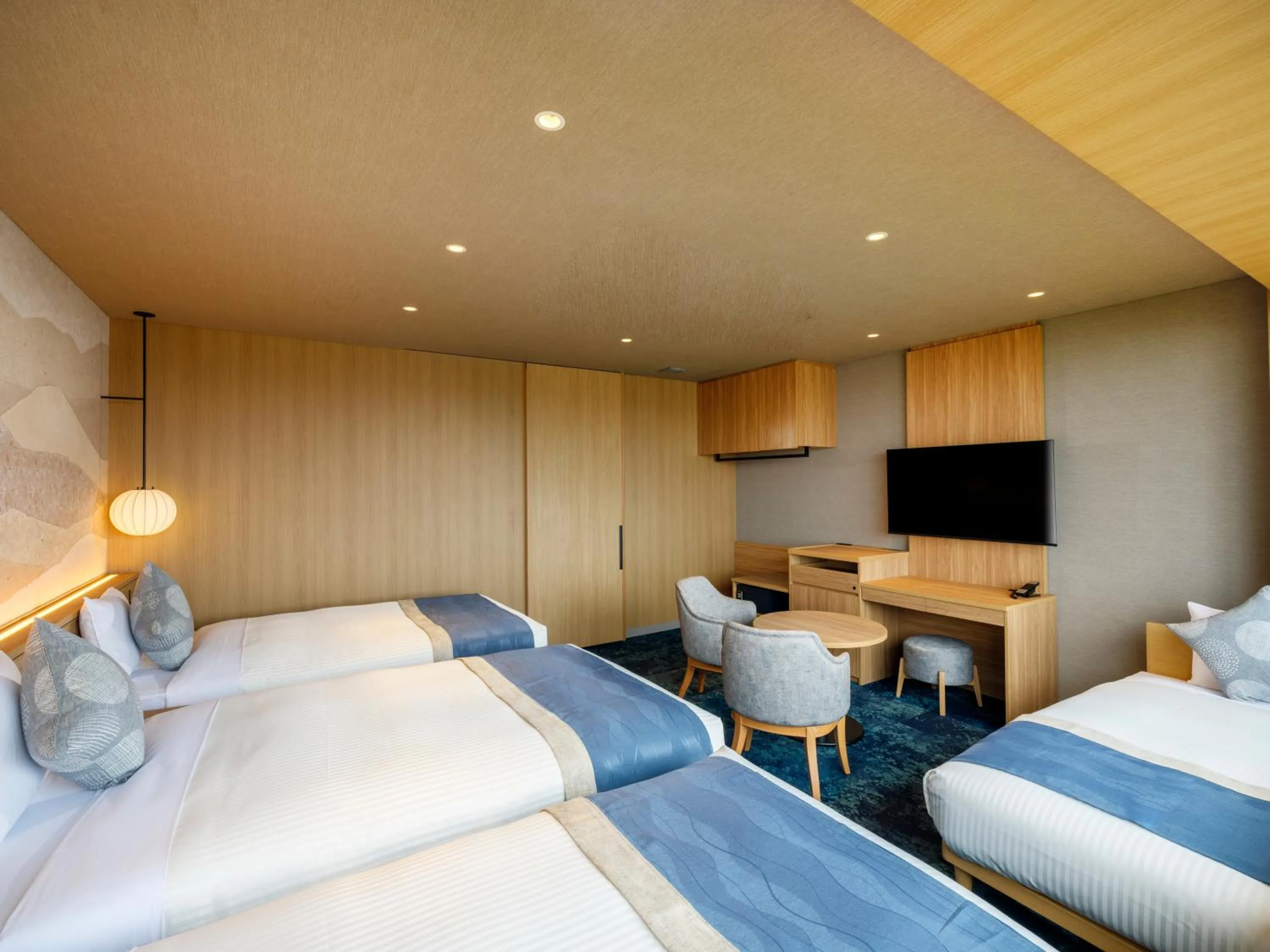 Bed in KAMENOI HOTEL Oarai