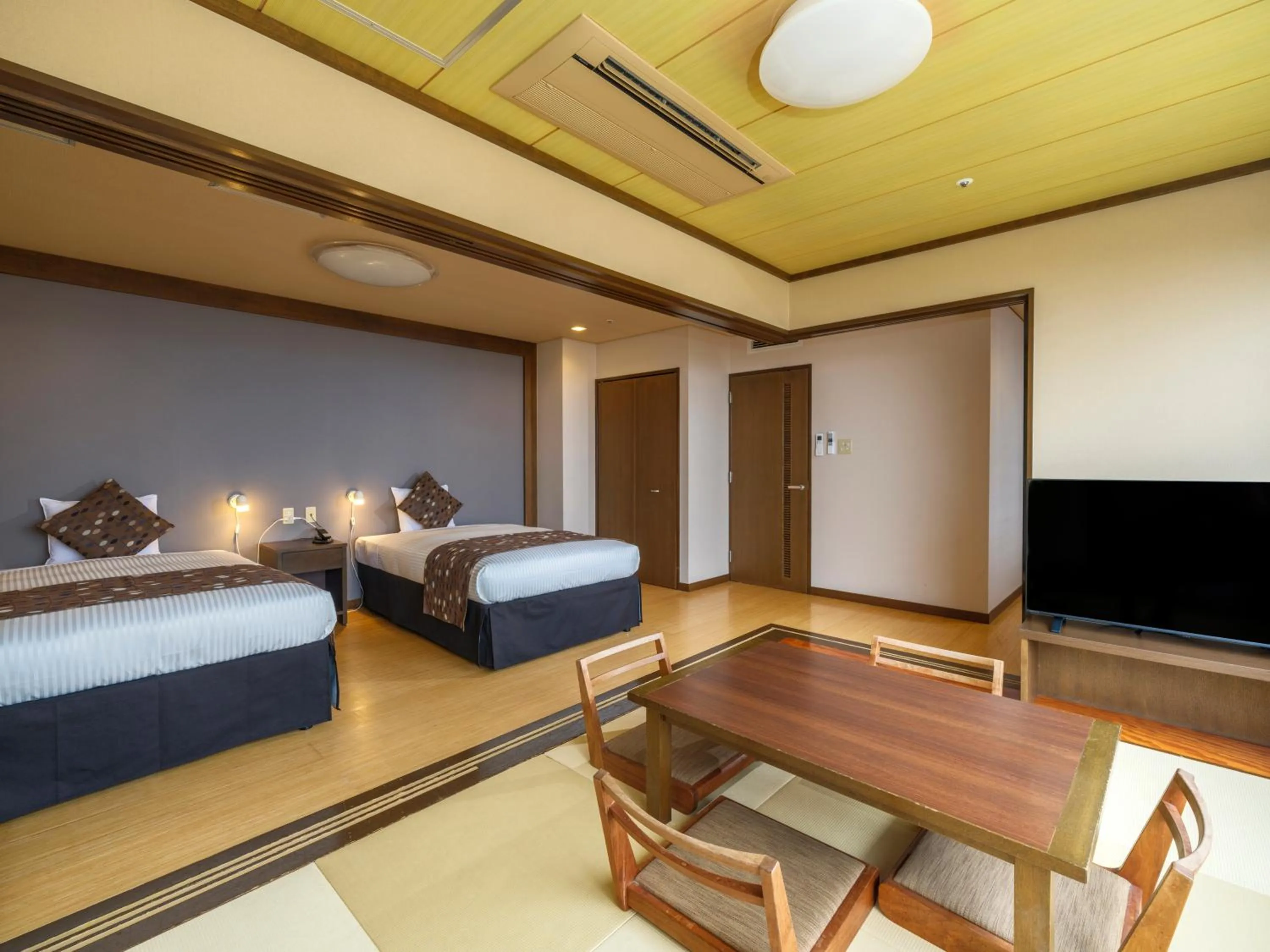 Photo of the whole room, Bed in KAMENOI HOTEL Oarai