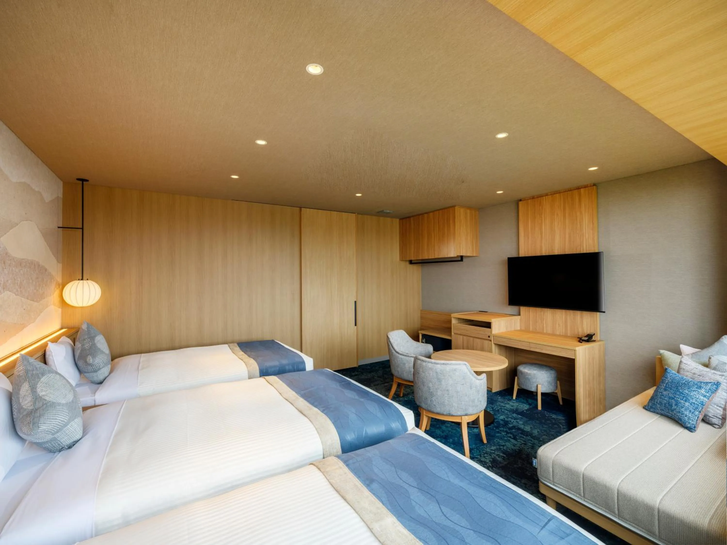 Bed in KAMENOI HOTEL Oarai