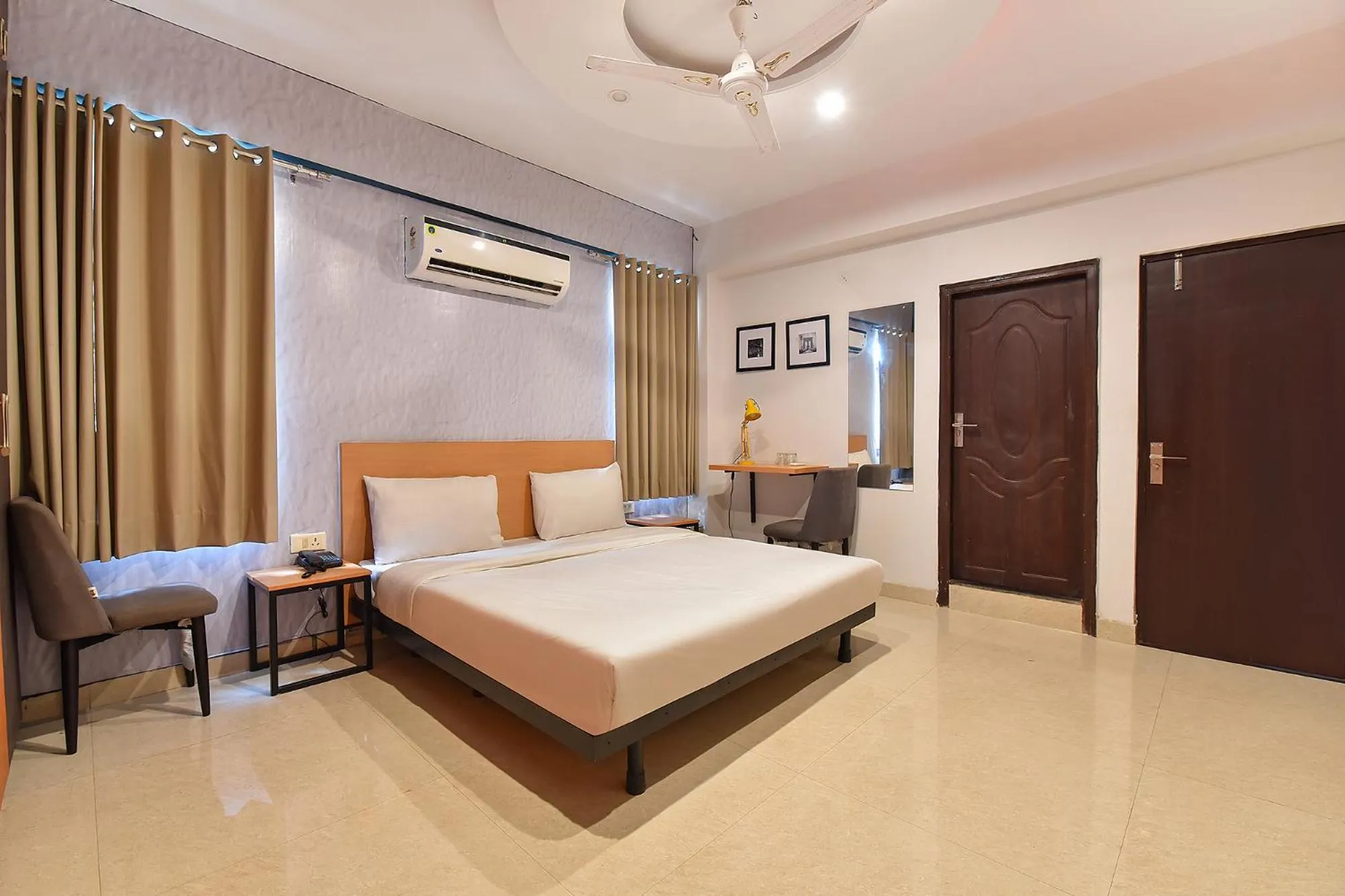 Bed in FabHotel Rushank Palace