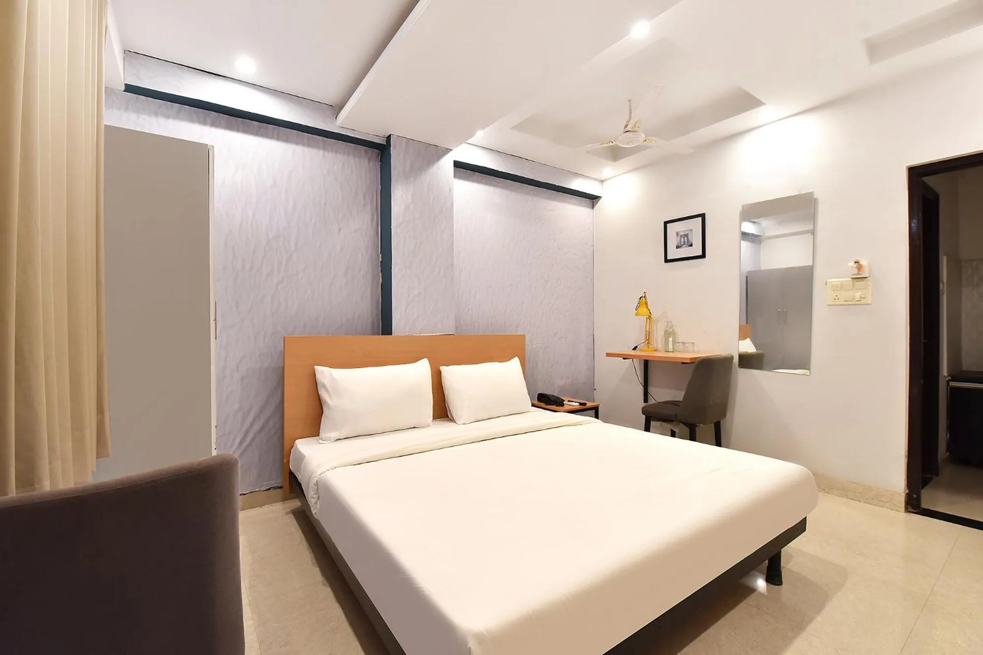 Bedroom in FabHotel Rushank Palace