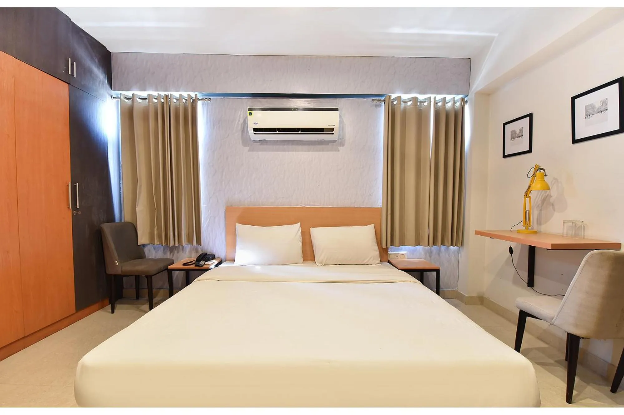 Bed in FabHotel Rushank Palace