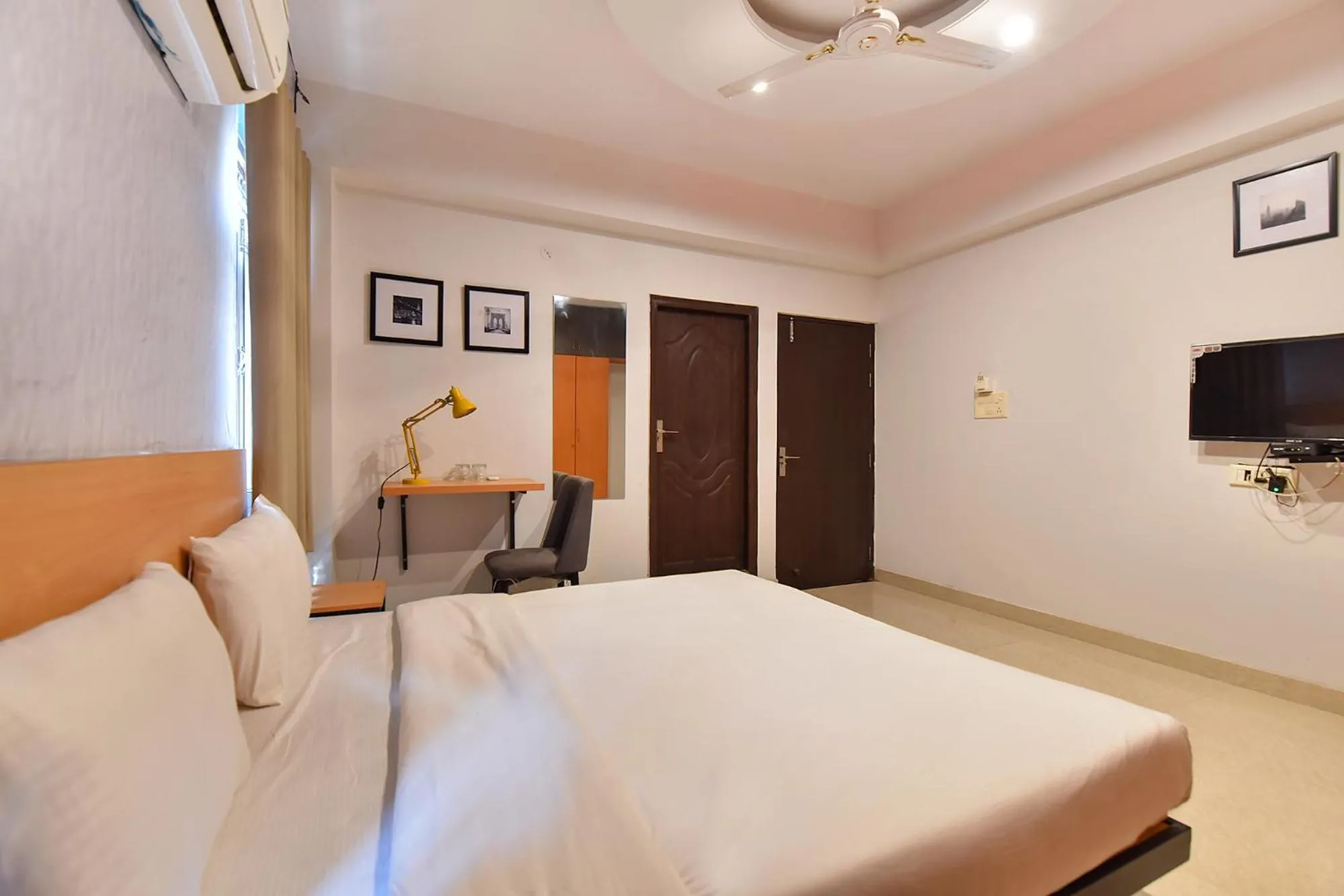 Bed in FabHotel Rushank Palace