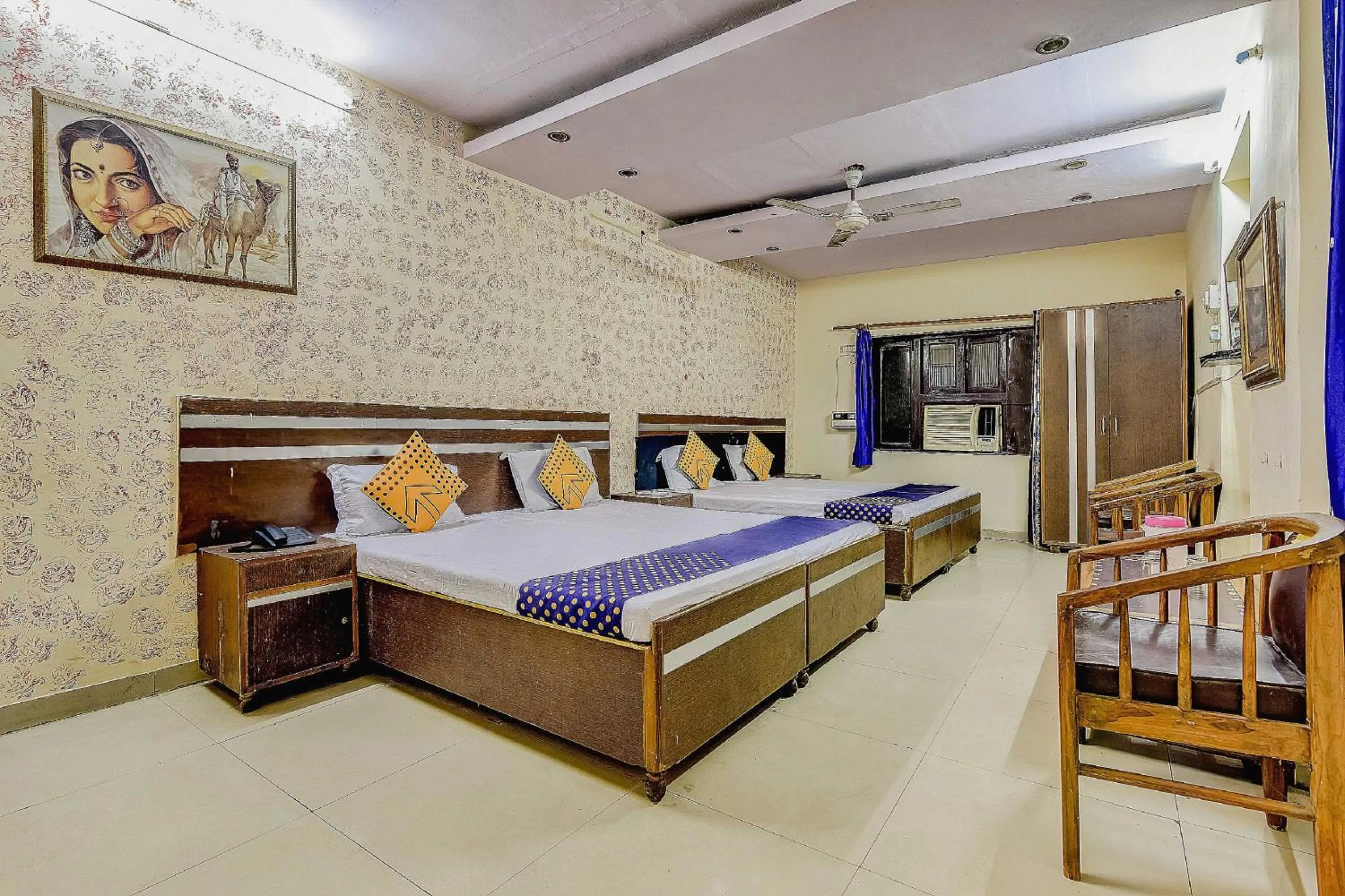 Bedroom, Bed in Spot On Swagat Palace