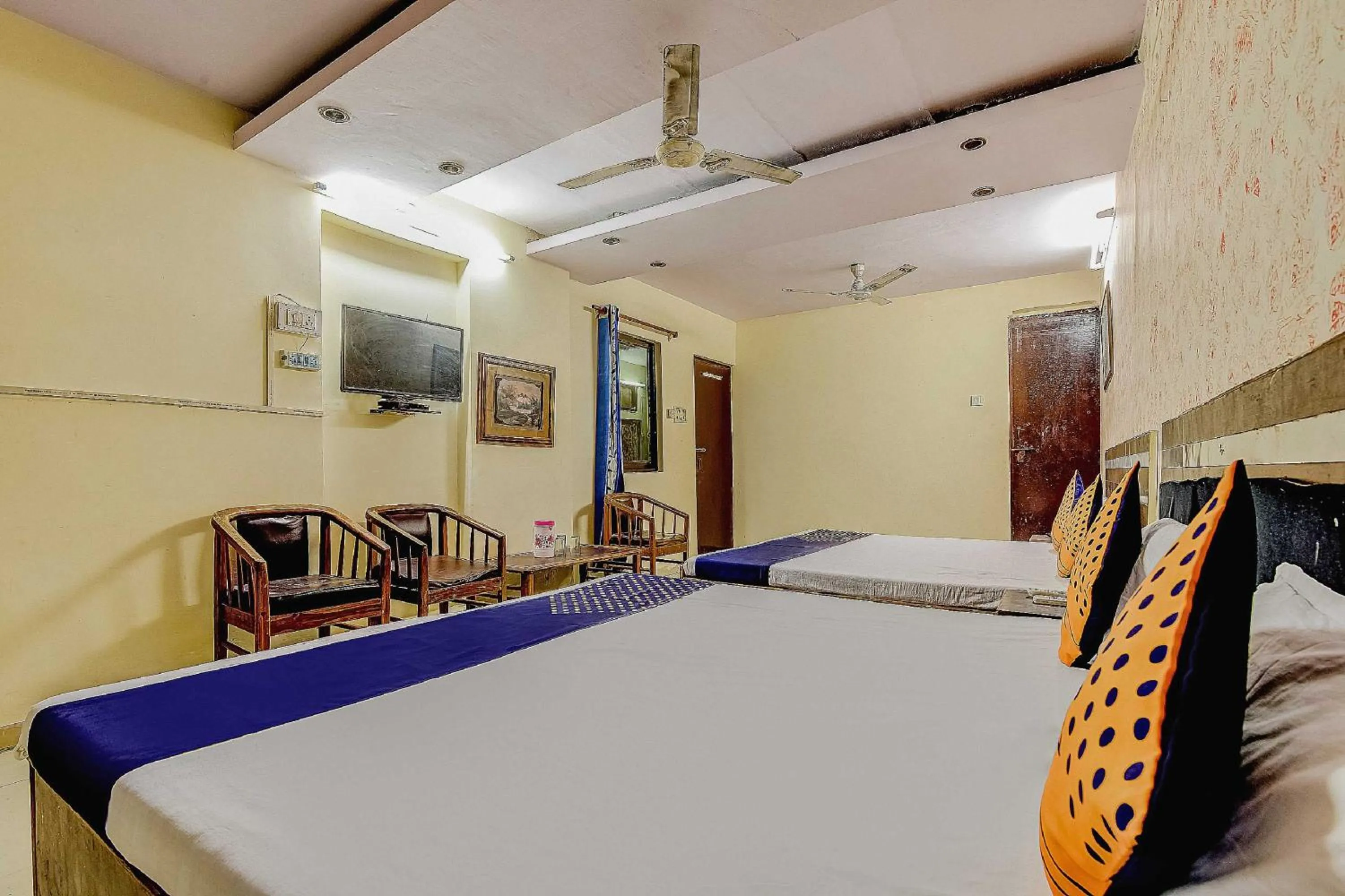 Bedroom, Bed in Spot On Swagat Palace