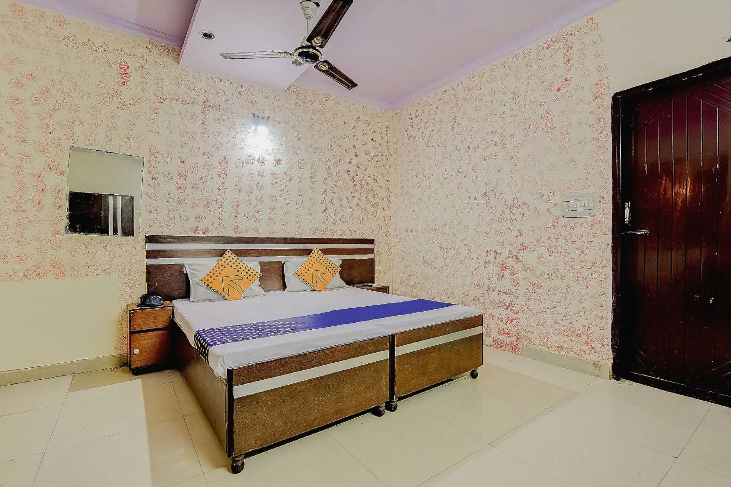 Bedroom, Bed in Spot On Swagat Palace