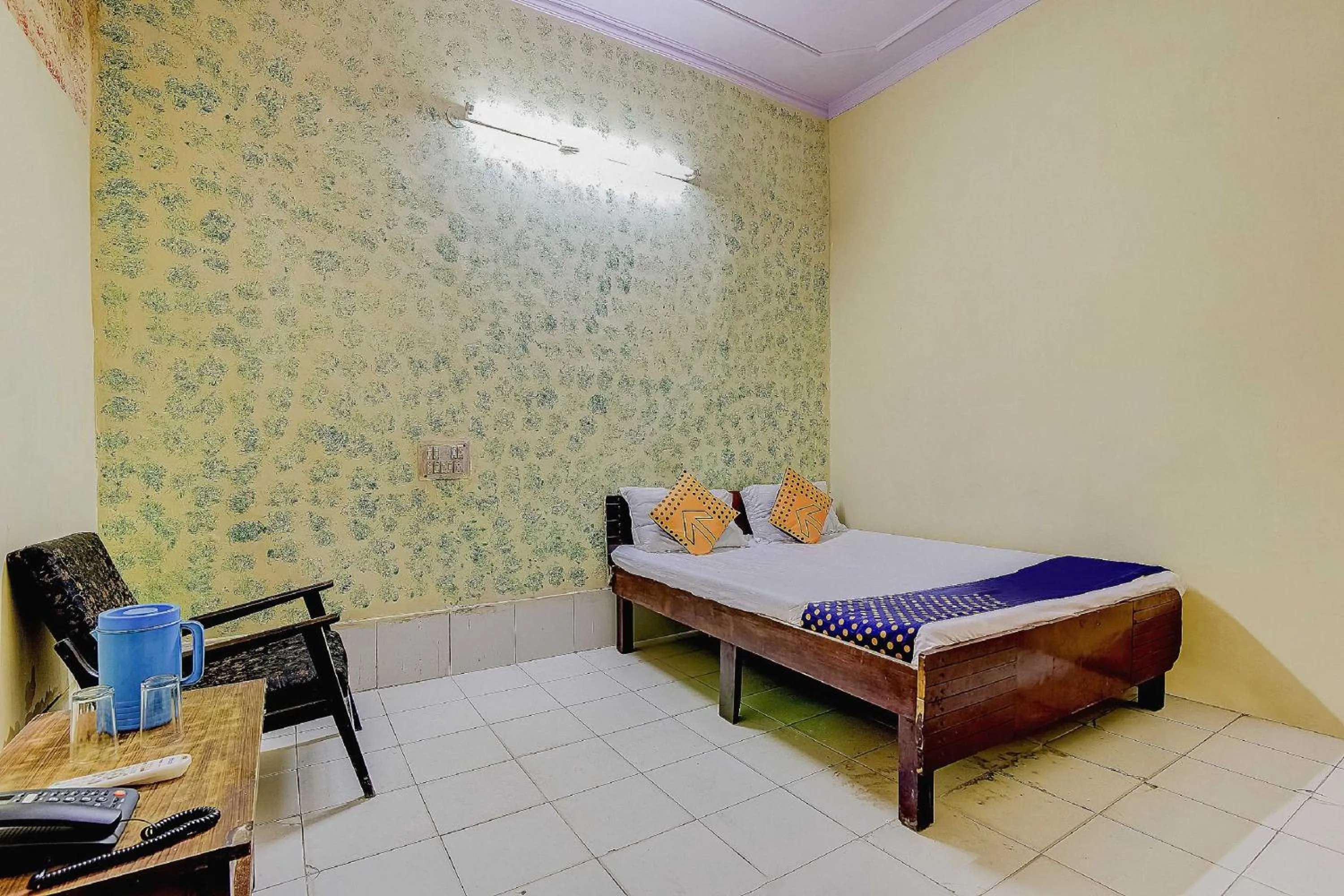 Bedroom, Bed in Spot On Swagat Palace