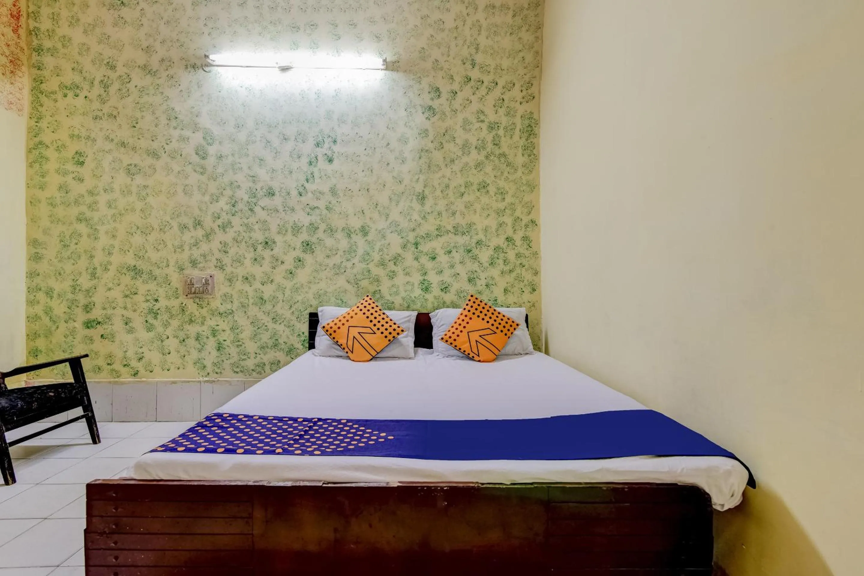 Bedroom, Bed in Spot On Swagat Palace