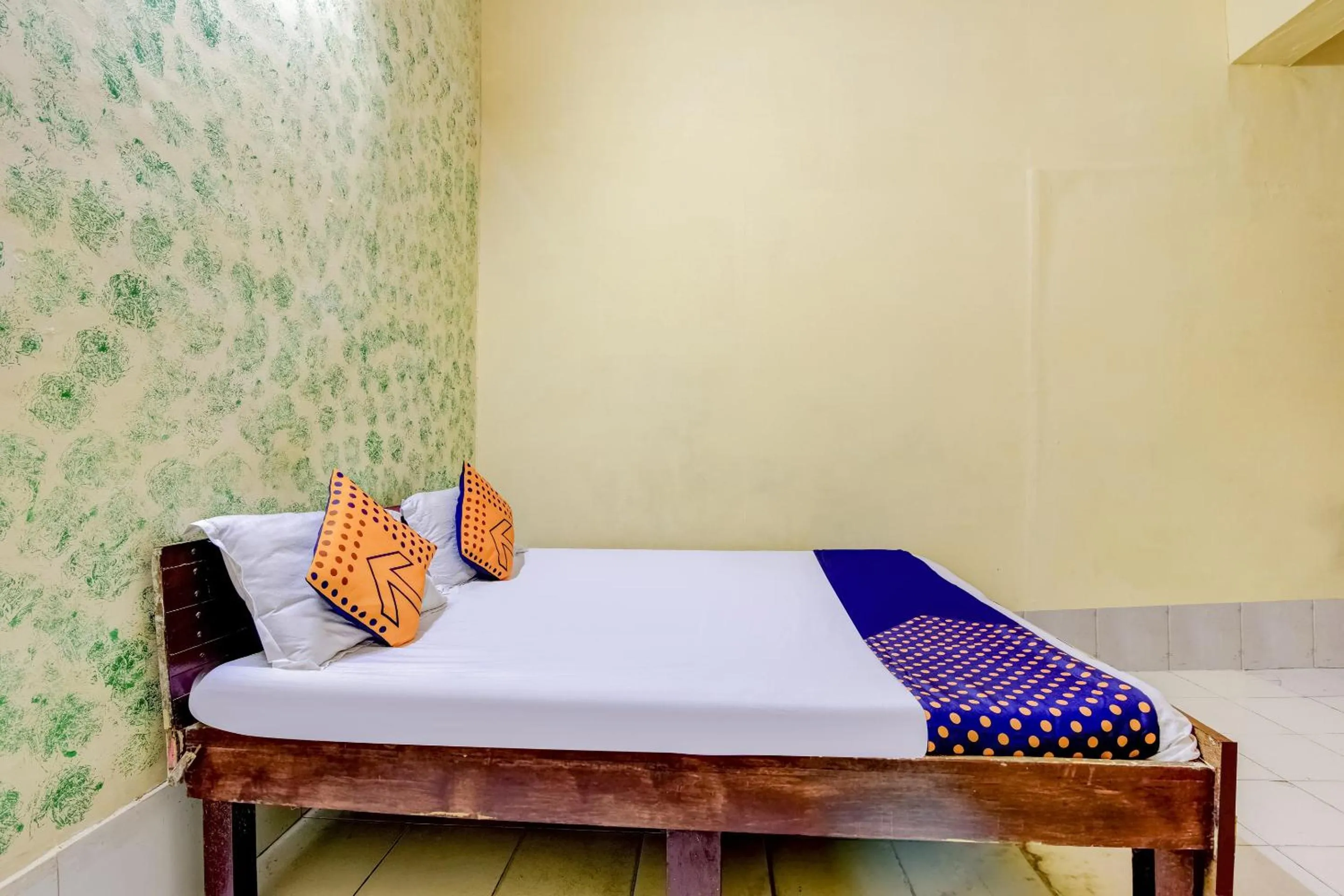 Bedroom, Bed in Spot On Swagat Palace