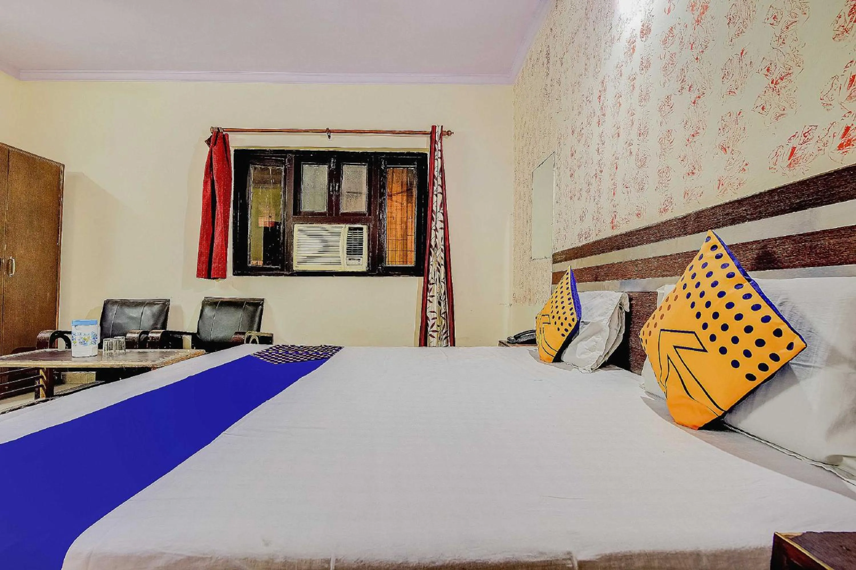 Bedroom, Bed in Spot On Swagat Palace