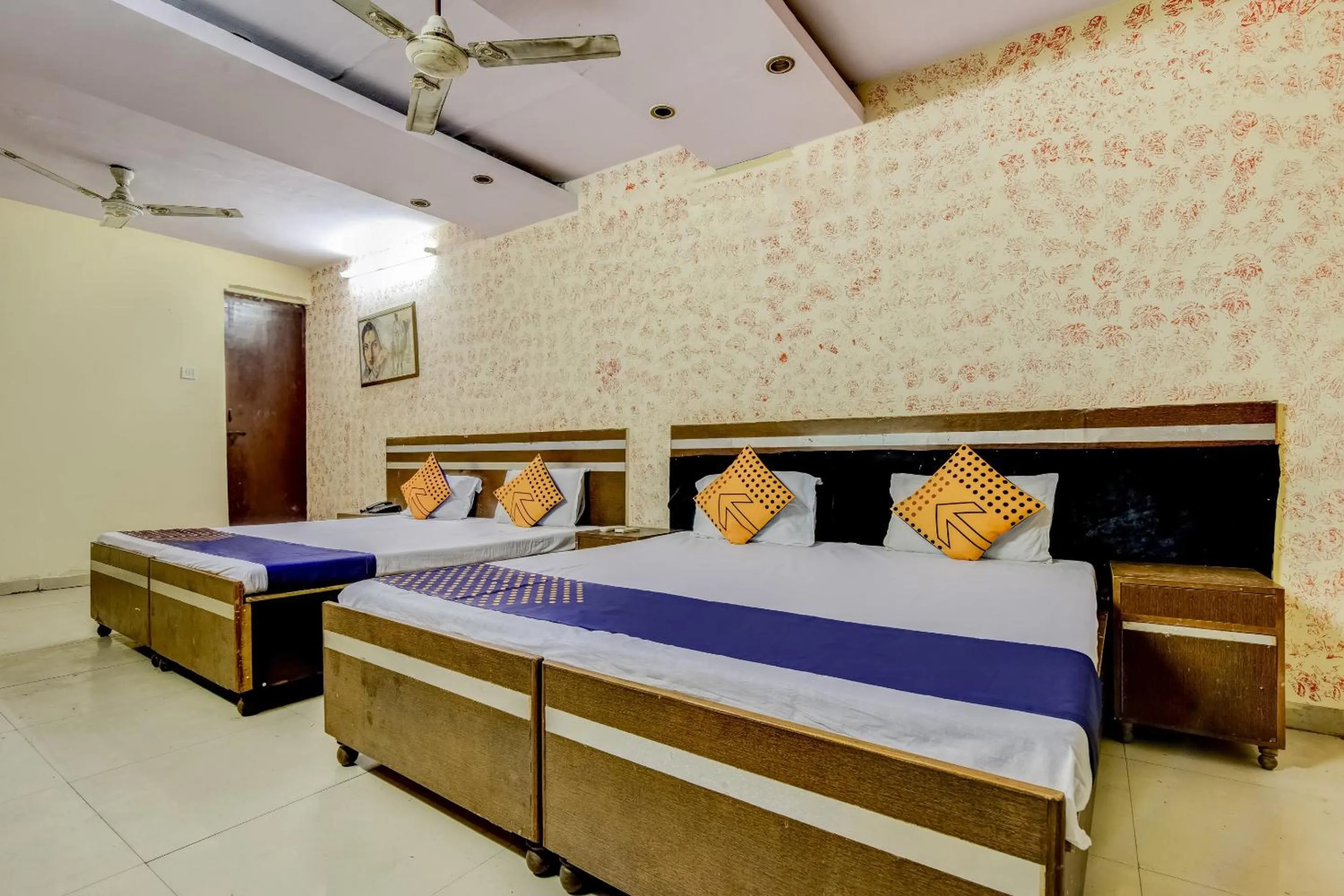 Bedroom, Bed in Spot On Swagat Palace