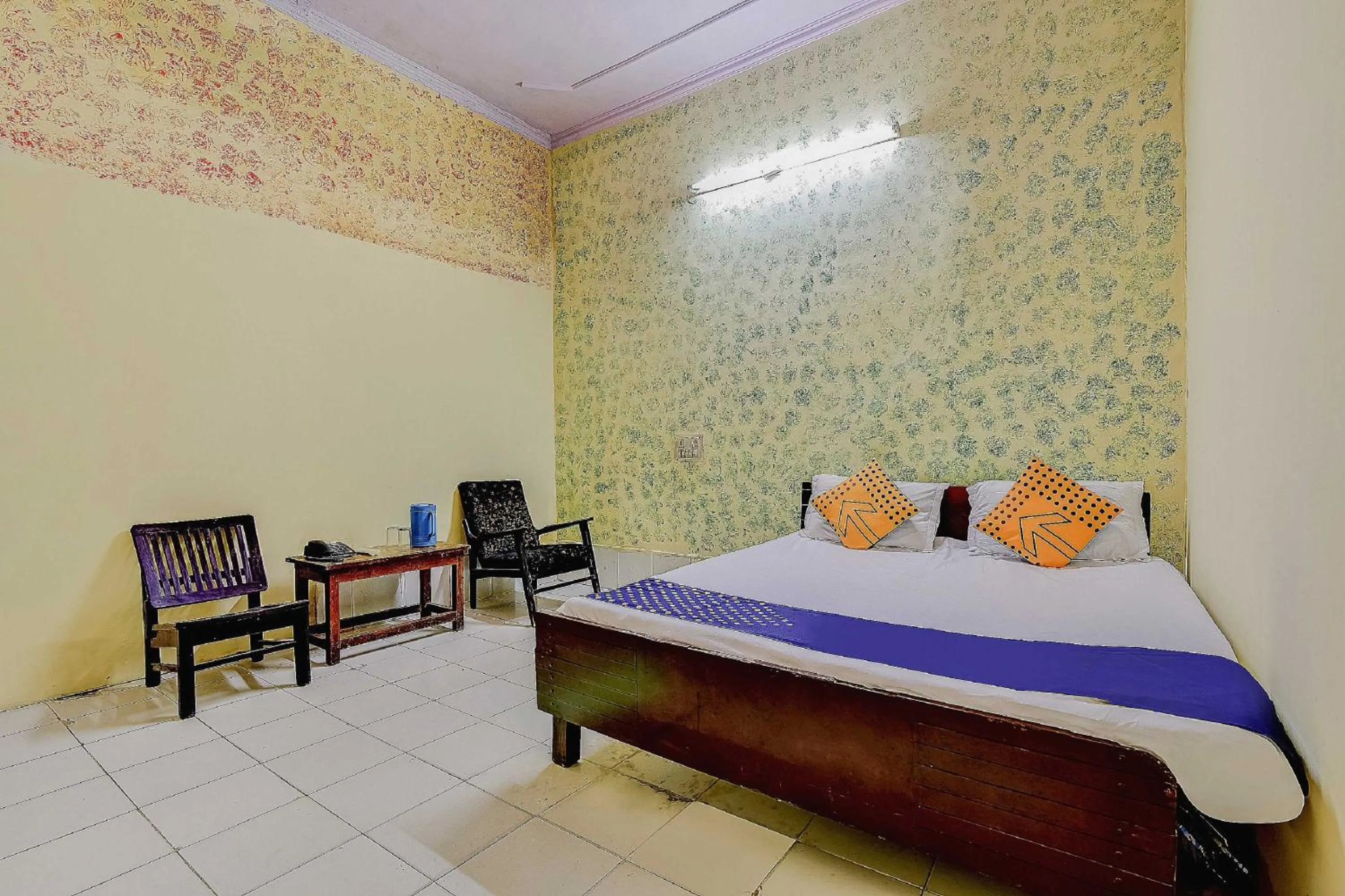 Bedroom, Bed in Spot On Swagat Palace